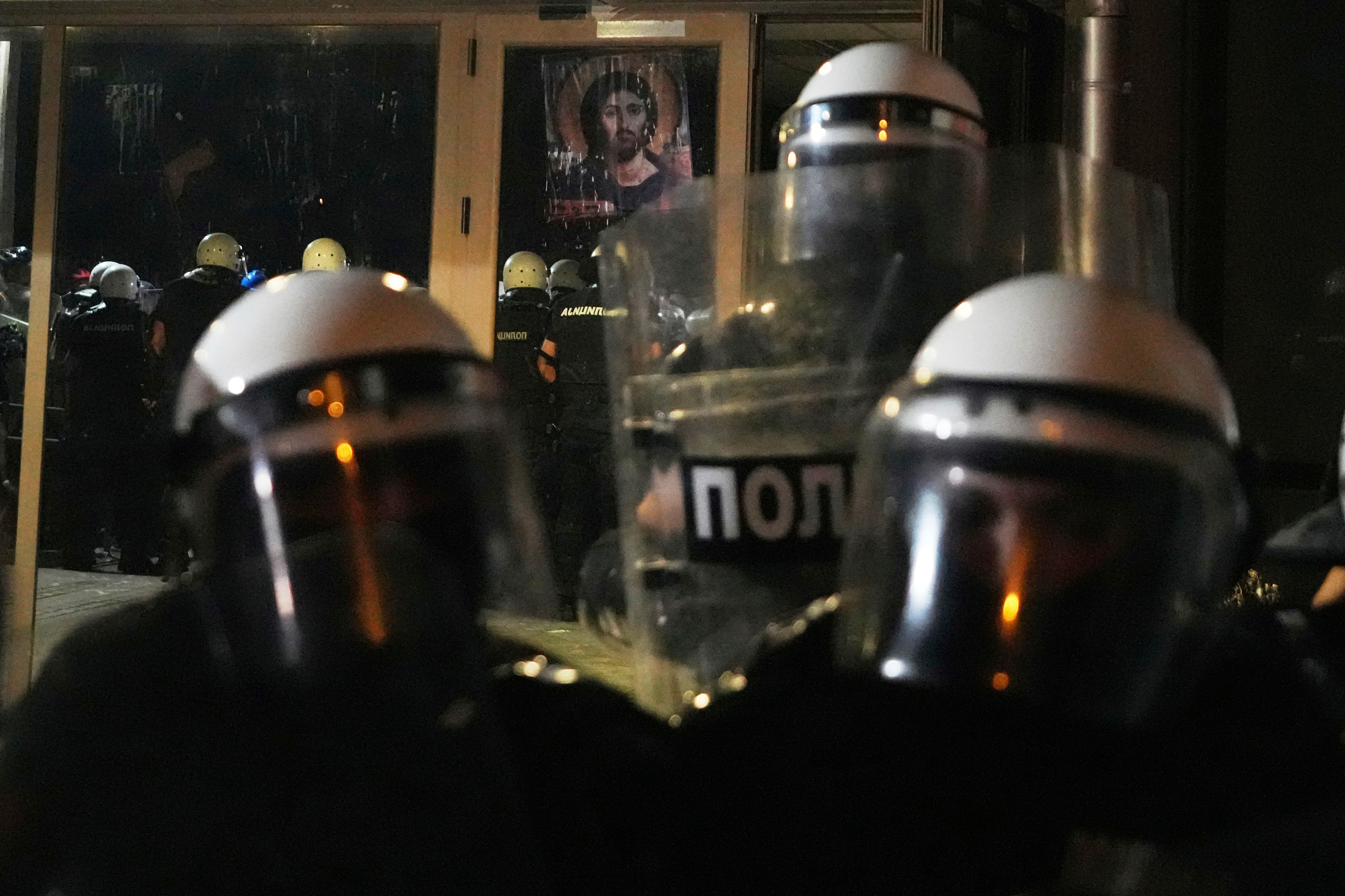 Serbian riot police guard Faculty of Philosophy during a protest against increasing police brutality in the northern Serbian city of Novi Sad, Friday, Sept. 5, 2025. (AP Photo/Darko Vojinovic)