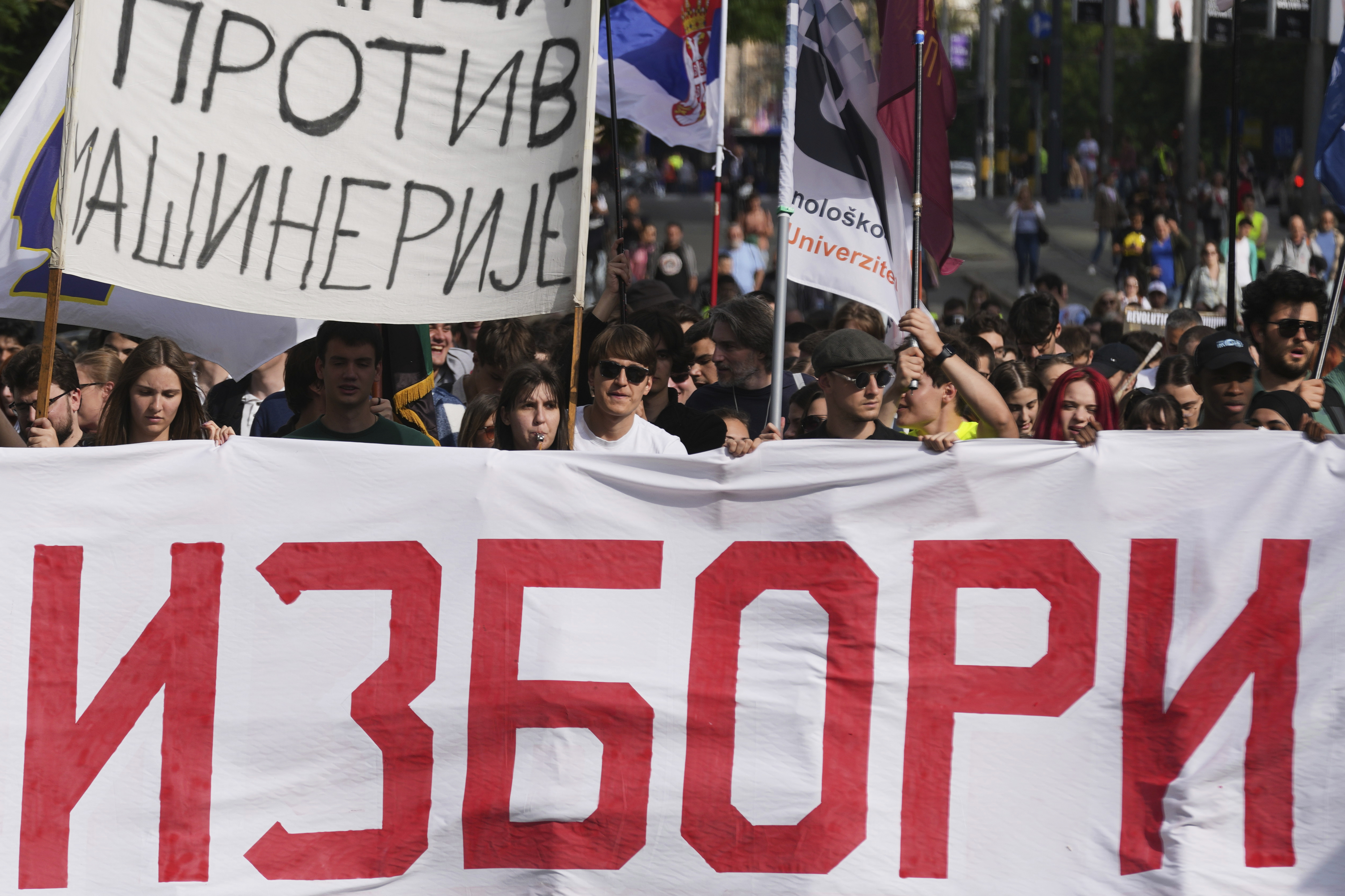 University students and people march during a protest, seven months after the deadly train station tragedy that sparked mass demonstrations against corruption in Belgrade, Serbia, Friday, May 30, 2025. (AP Photo/Darko Vojinovic)