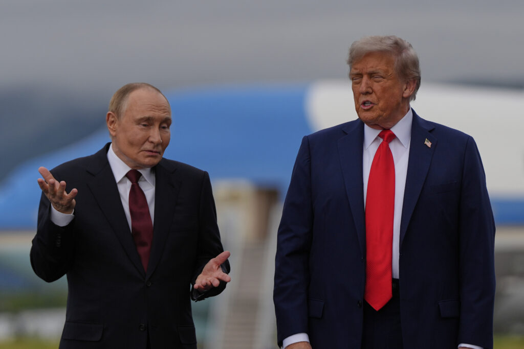 President Donald Trump talks with Russia's President Vladimir Putin Friday, Aug. 15, 2025, at Joint Base Elmendorf-Richardson, Alaska. (AP Photo/Julia Demaree Nikhinson)