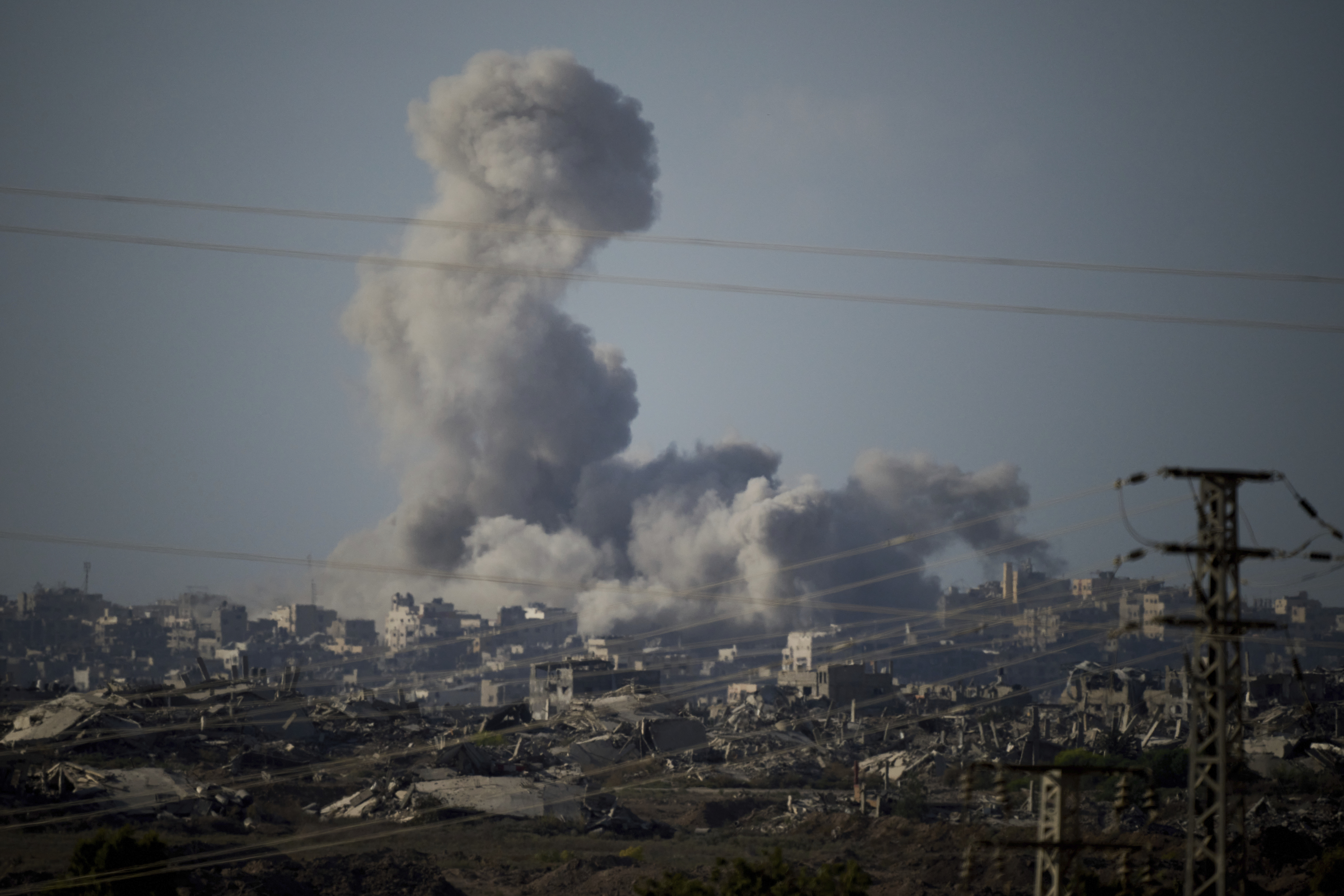 Smoke rises to the sky following an Israeli military strike in the Gaza Strip, as seen from southern Israel, Tuesday, Sept. 16, 2025. (AP Photo/Leo Correa)