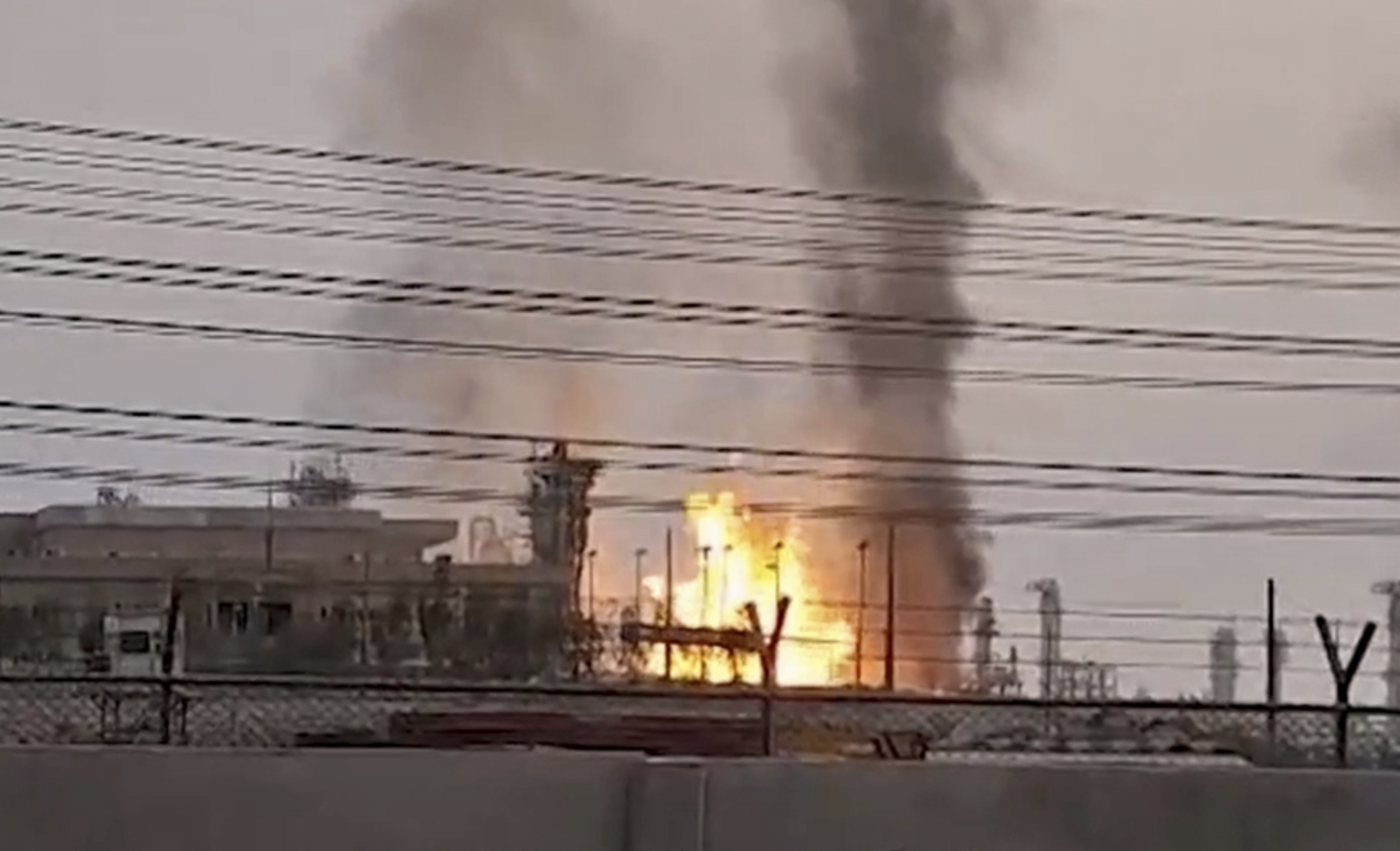 This frame grab taken from Islamic Republic of Iran Broadcasting (IRIB) shows a refinery in Iran's South Pars gas field after it was struck by an Israeli drone in Kangan, in Iran's Bushehr province, Saturday, June 14, 2025. (IRIB via AP)