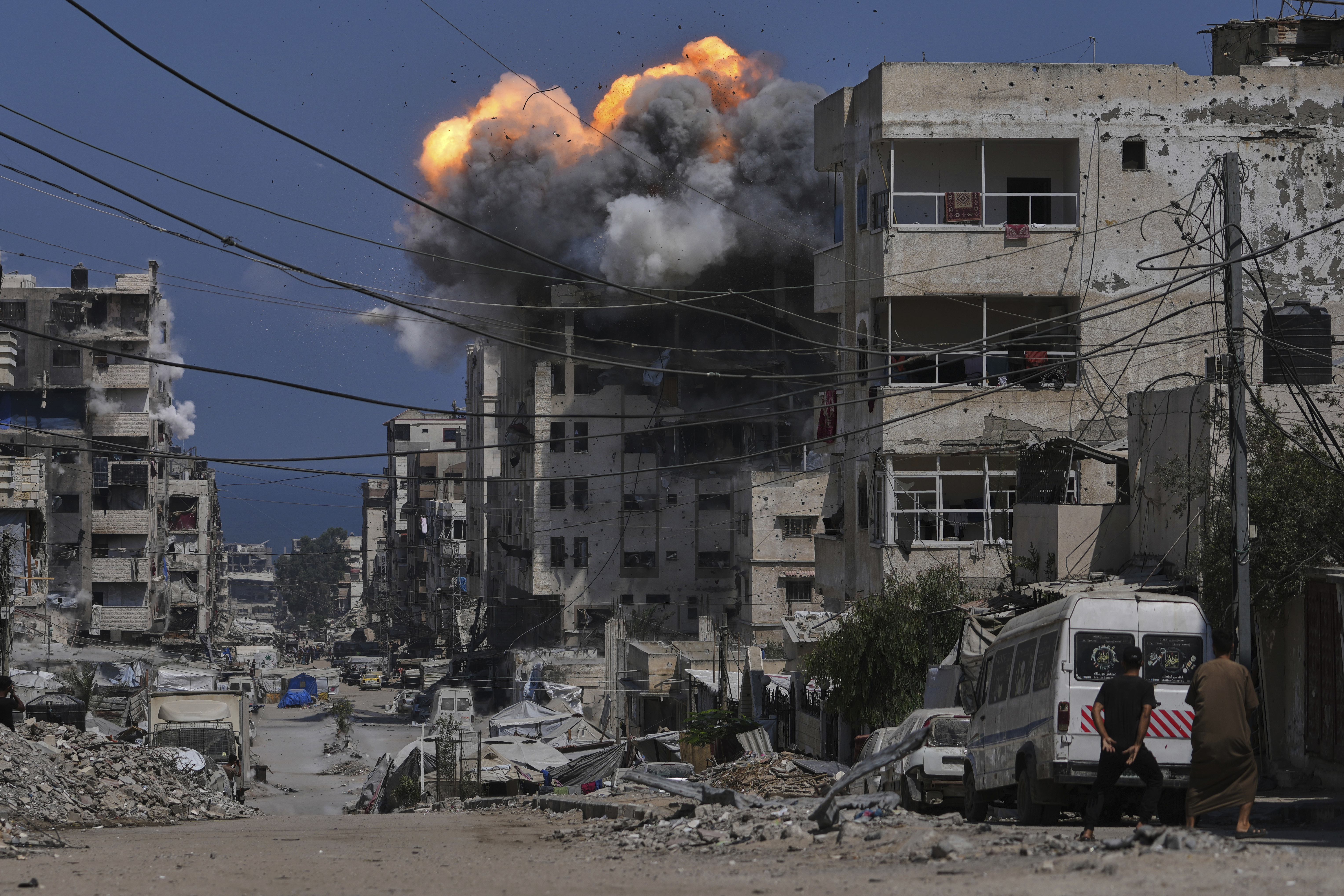 Smoke and flames erupt from an Israeli airstrike in Gaza City, Monday, July 21, 2025. (AP Photo/Jehad Alshrafi)
