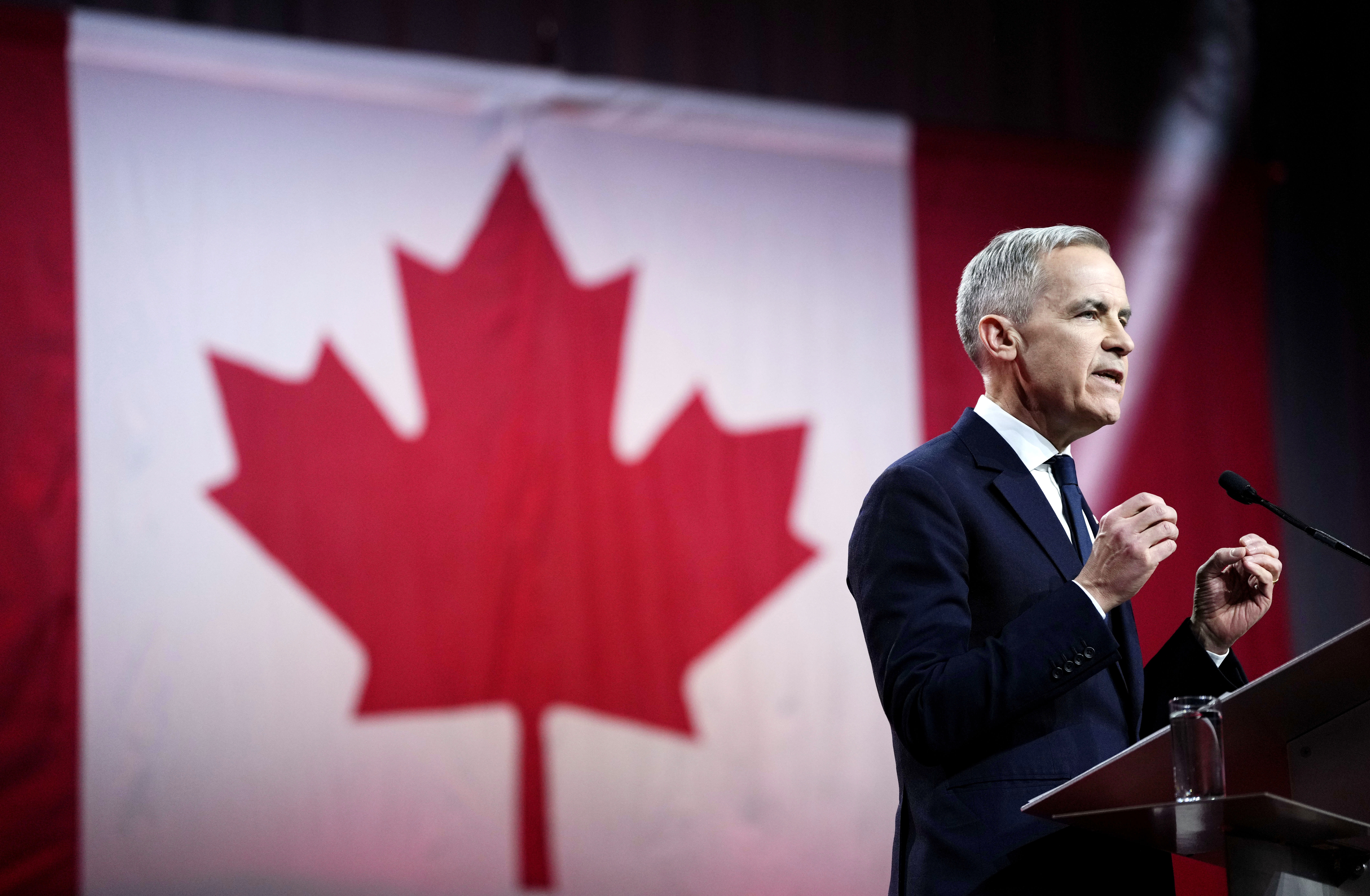 Mark Carney, Leader of the Liberal Party of Canada, speaks after being announced the winner at the Liberal Leadership Event in Ottawa, Ontario, Sunday, March 9, 2025. (Justin Tang/The Canadian Press via AP)