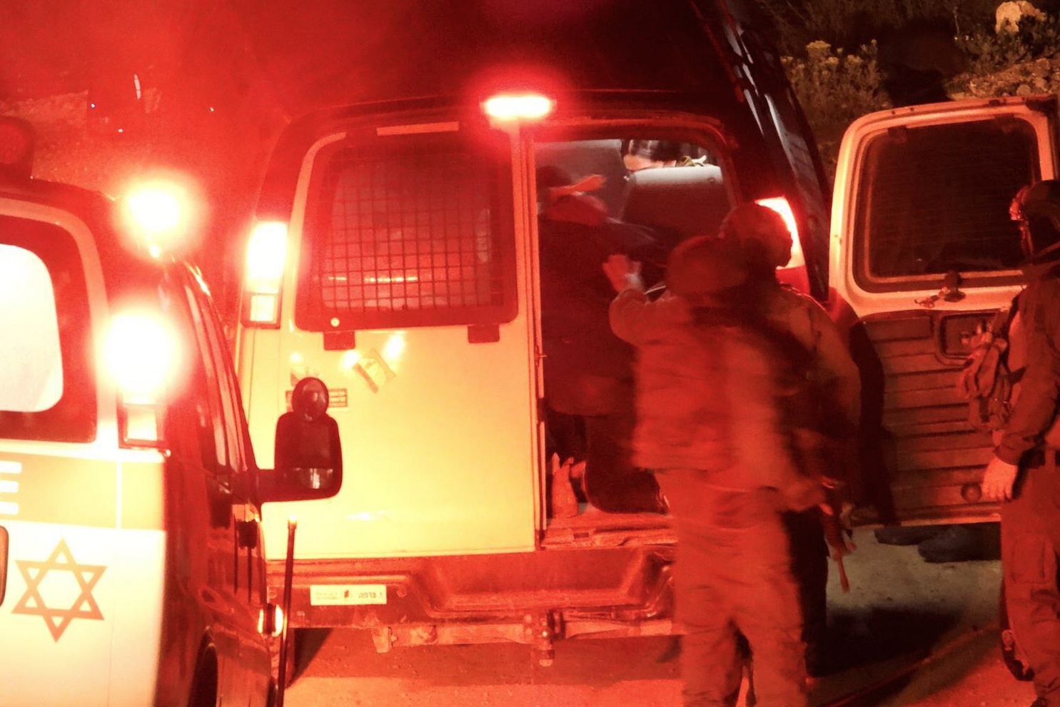 CORRECTS DATE: Hamdan Ballal, Palestinian co-director of Oscar-winning documentary No Other Land, is detained by the Israeli military from his home in the Israeli-occupied West Bank, Monday, March 24, 2025. (Raviv Rose via AP)