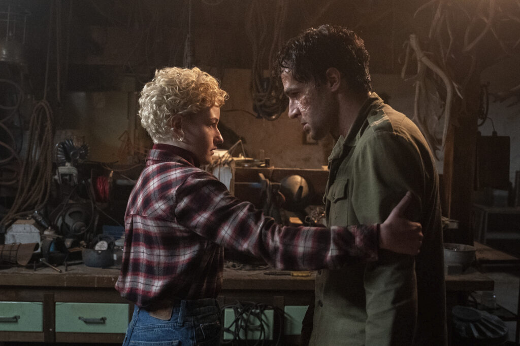 This image released by Universal Pictures shows Julia Garner, left, and Christopher Abbott in a scene from "Wolf Man." (Nicola Dove/Universal Pictures via AP)