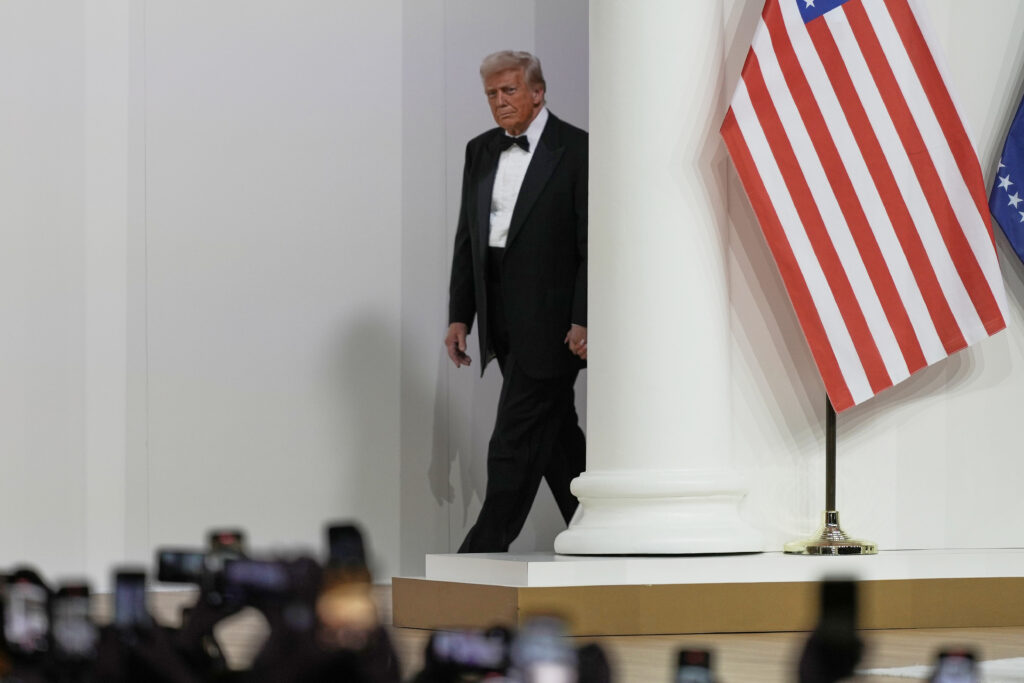 President Donald Trump arrives at the Commander in Chief Ball, part of the 60th Presidential Inauguration, Monday, Jan. 20, 2025, in Washington. (AP Photo/Ben Curtis)