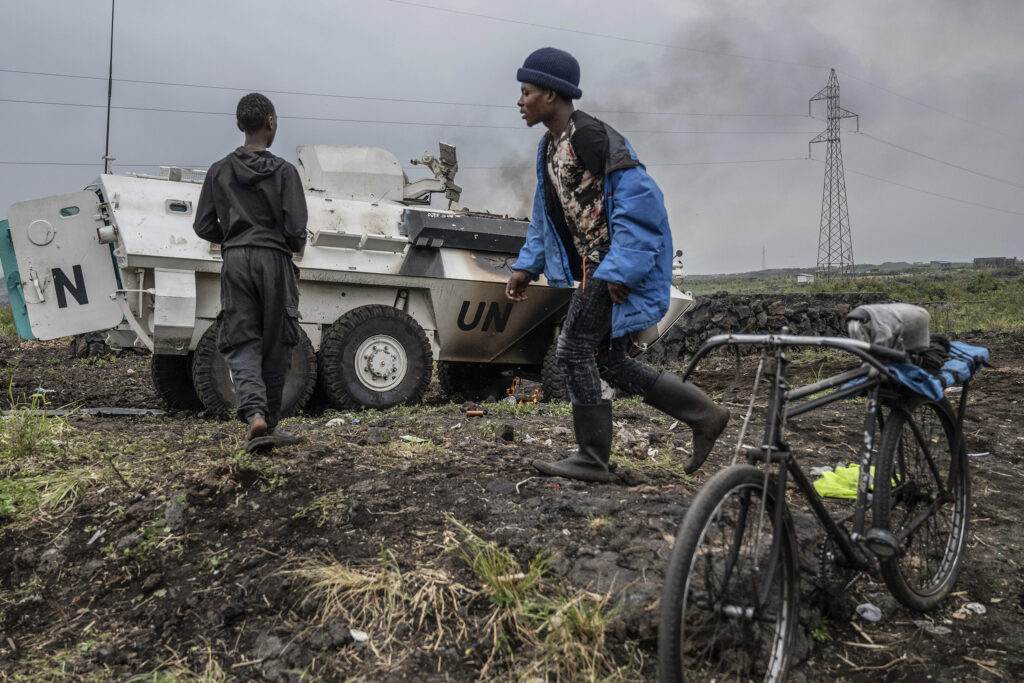 CAPTION CORRECTS YEAR A UN armoured personnel carrier burns, during clashes with M23 rebels outside Goma, Democratic Republic of the Congo, Saturday, Jan. 25, 2025. (AP Photo/Moses Sawasawa)