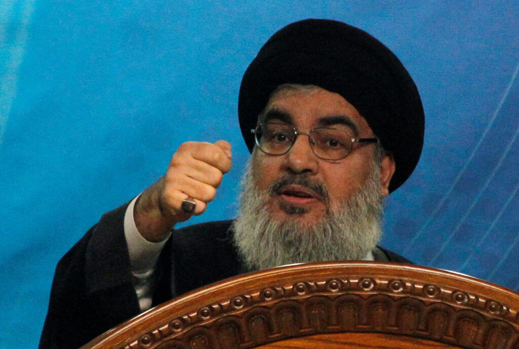FILE PHOTO: Lebanon's Hezbollah leader Sayyed Hassan Nasrallah makes a rare public appearance as he addresses his supporters during a rally to mark "Quds (Jerusalem) Day" in Beirut's southern suburbs July 25, 2014. REUTERS/Sharif Karim/File Photo