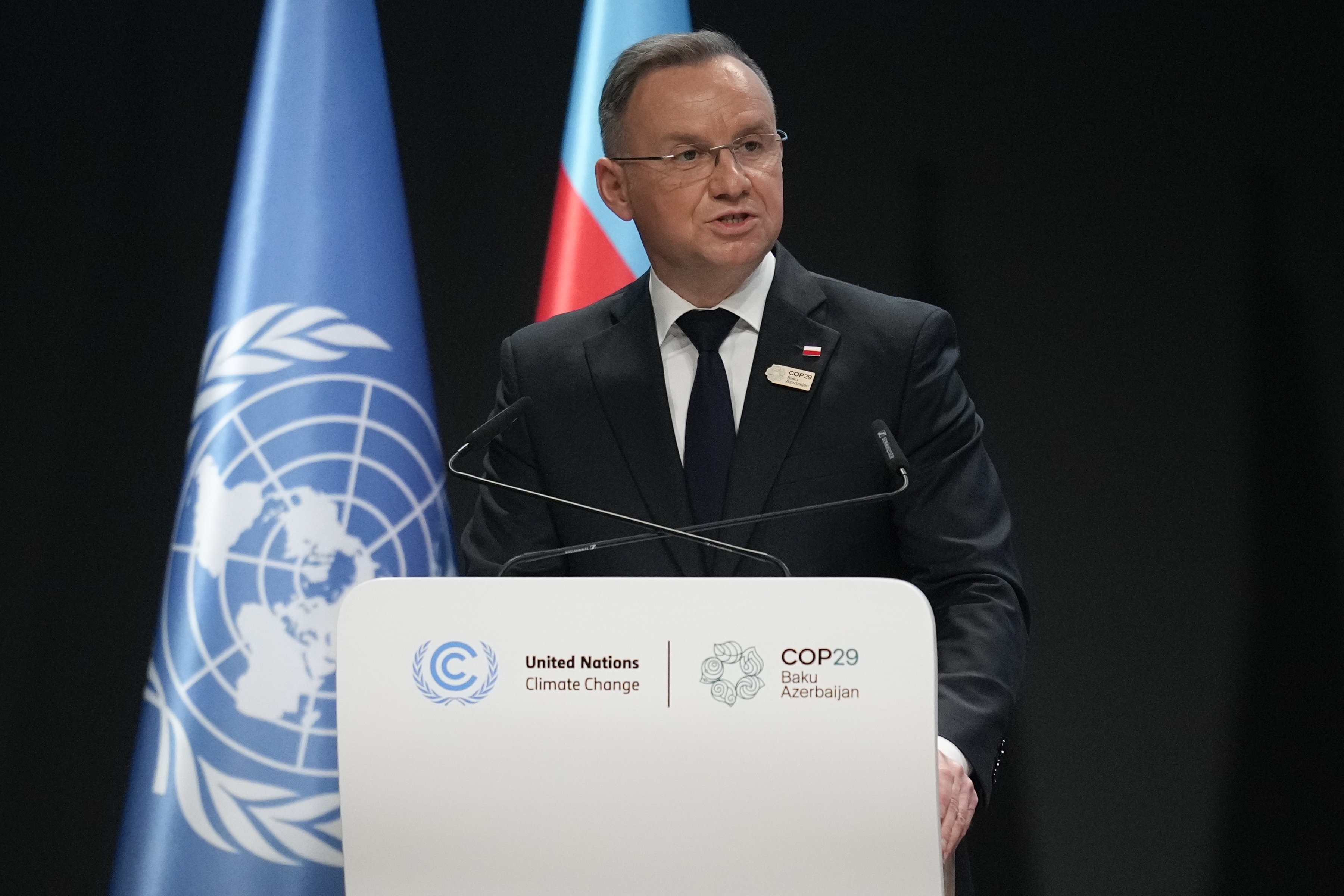 Poland President Andrzej Duda speaks during a plenary session at the COP29 U.N. Climate Summit, Tuesday, Nov. 12, 2024, in Baku, Azerbaijan. (AP Photo/Rafiq Maqbool)