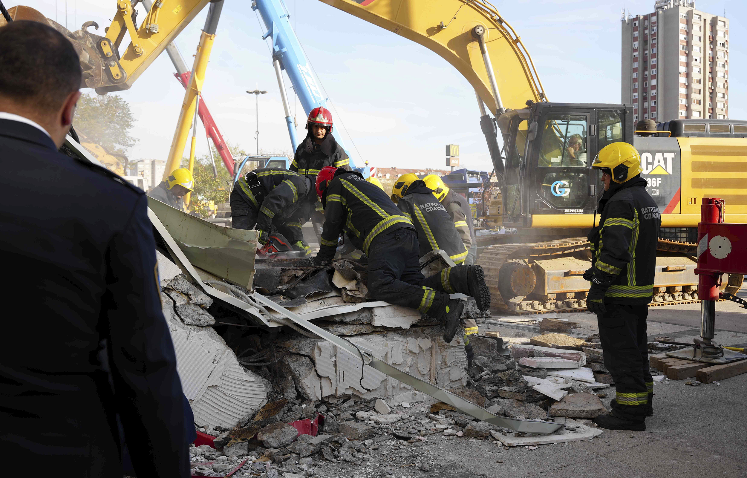 Rescue service workers inspect a scene as a roof collapsed at a railway station, Friday Nov. 1, 2024, in Novi Sad, Serbia. (AP Photo/Interior Ministry of Serbia/HO)