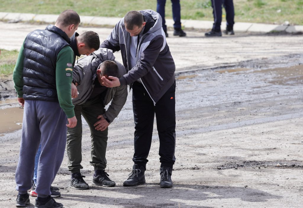 Family members of miners react outside a coal mine, after a shaft collapsed killing at least eight miners, according to RTS state television, in Sokobanja, southern Serbia, April 1, 2022. REUTERS/Antonio Bronic