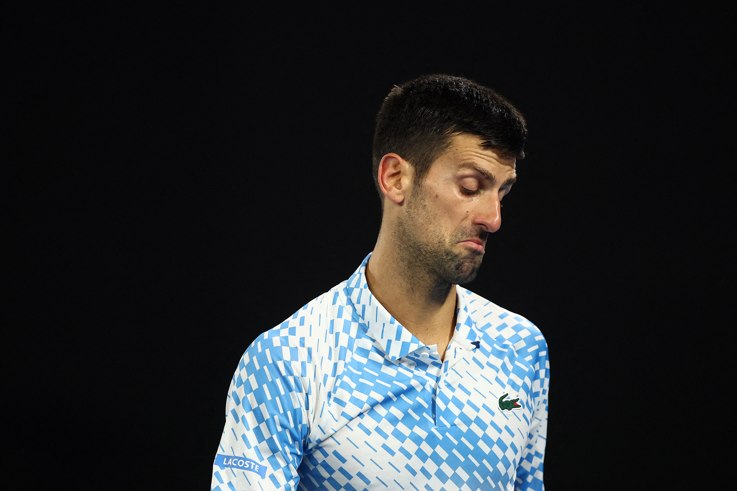 Tennis - Australian Open - Men's Singles Final - Melbourne Park, Melbourne, Australia - January 29, 2023
Serbia's Novak Djokovic reacts during his final match against Greece's Stefanos Tsitsipas REUTERS/Hannah Mckay