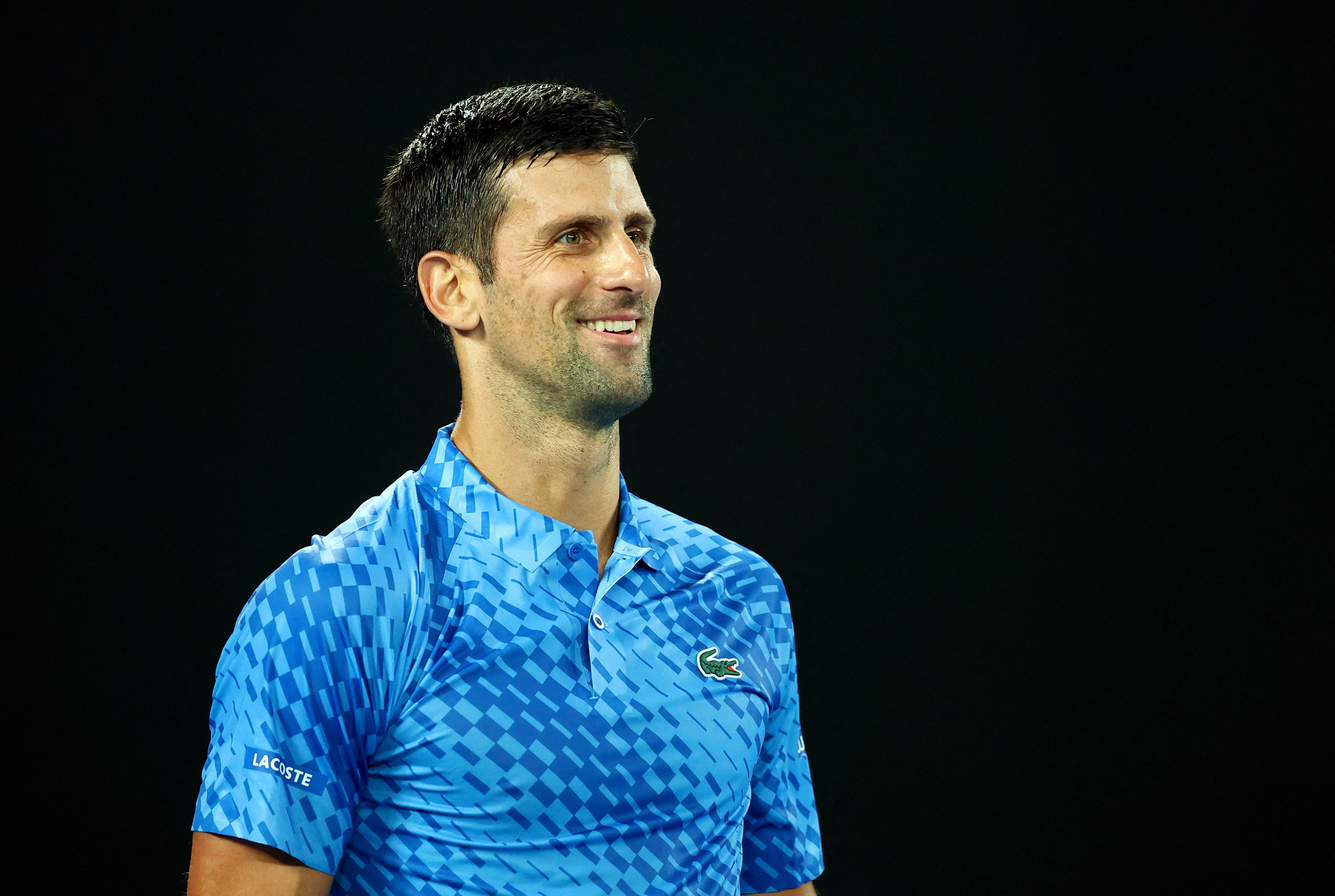 Tennis - Australian Open - Melbourne Park, Melbourne, Australia - January 17, 2023 Serbia's Novak Djokovic reacts during his first round match against Spain's Roberto Carballes Baena REUTERS/Carl Recine