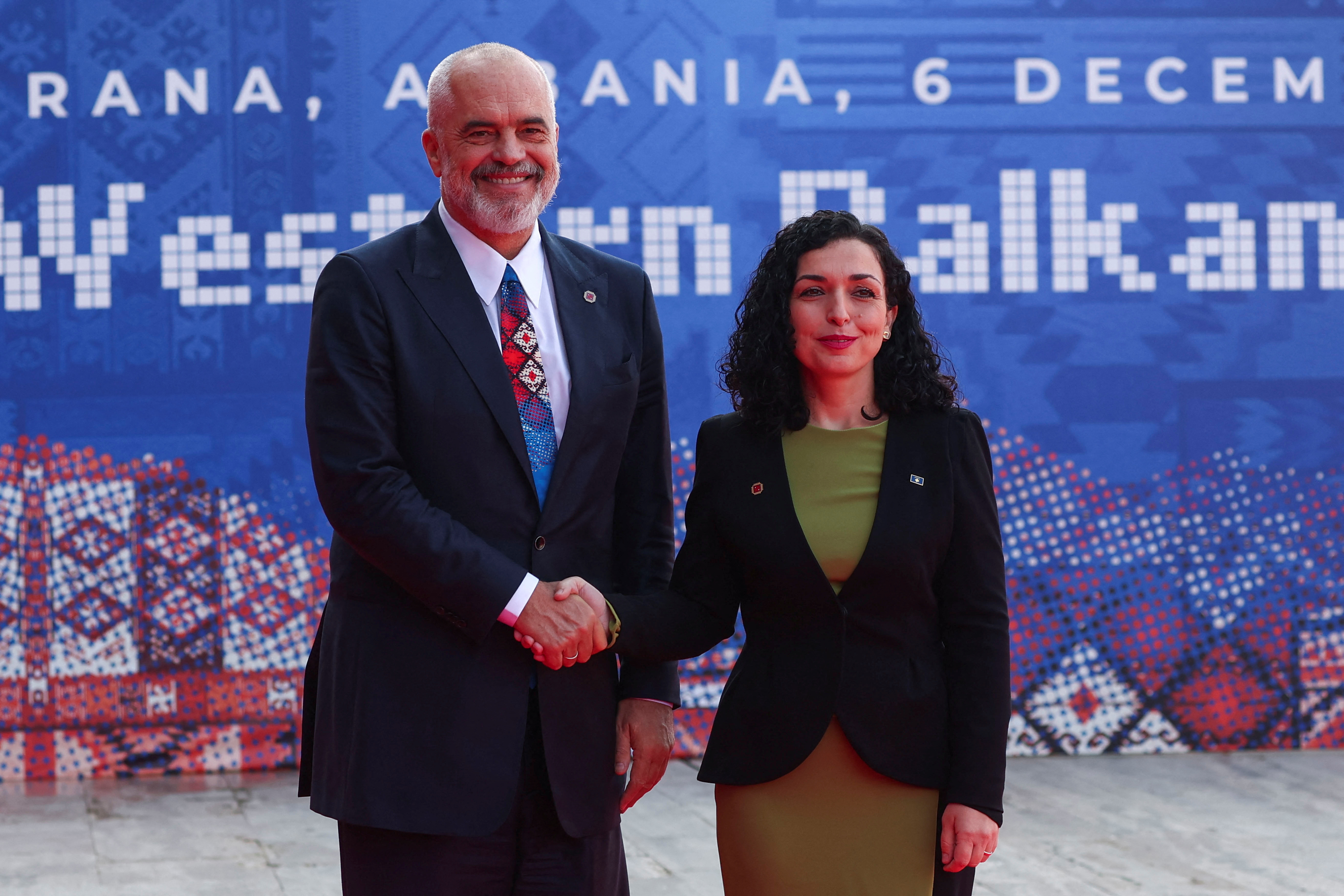 Albania's Prime Minister Edi Rama welcomes Kosovo's President Vjosa Osmani-Sadriu before the EU-Western Balkans summit in Tirana, Albania, December 6, 2022. REUTERS/Florion Goga