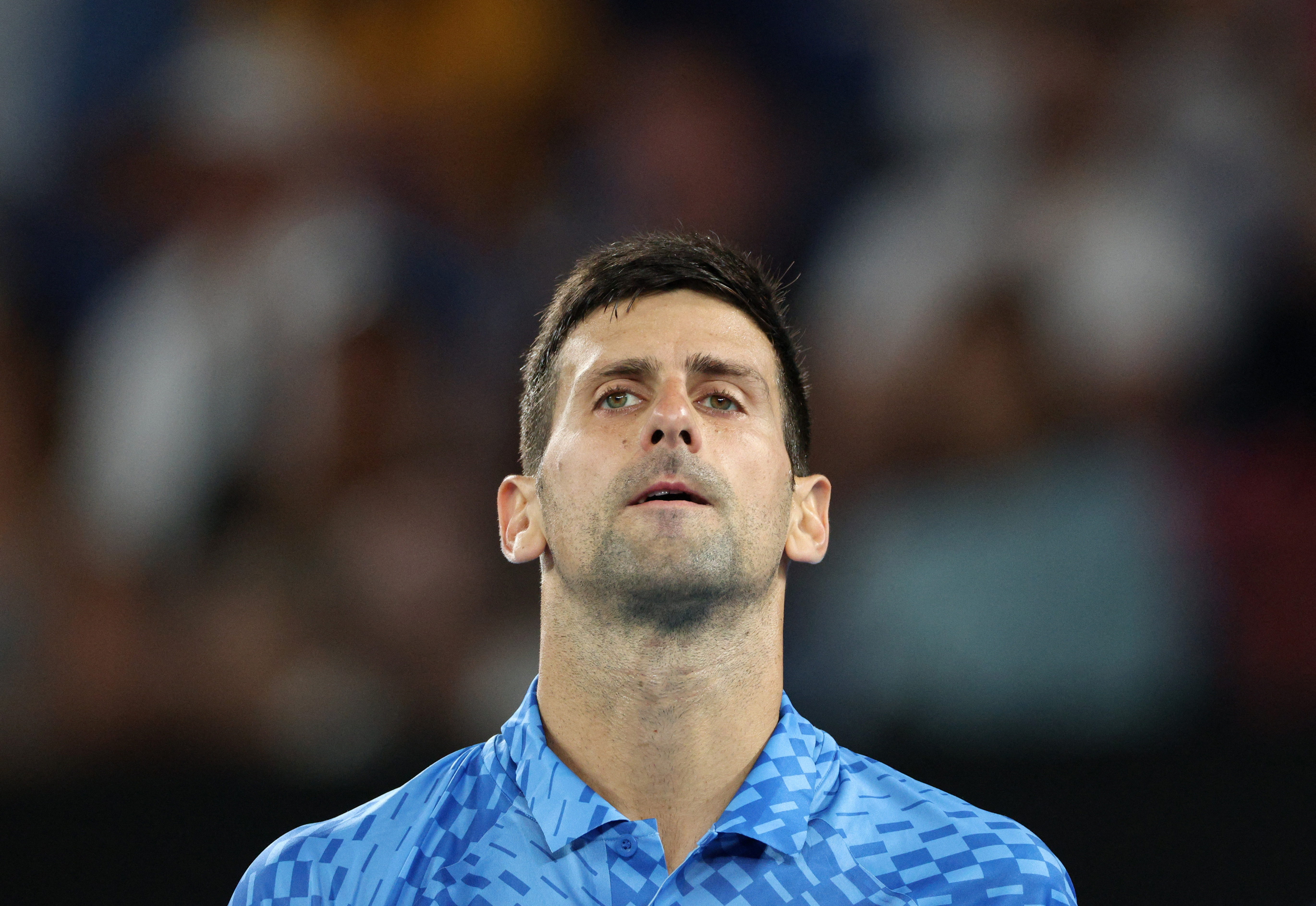 Tennis - Australian Open - Melbourne Park, Melbourne, Australia - January 21, 2023 Serbia's Novak Djokovic reacts during his third round match against Bulgaria's Grigor Dimitrov REUTERS/Loren Elliott