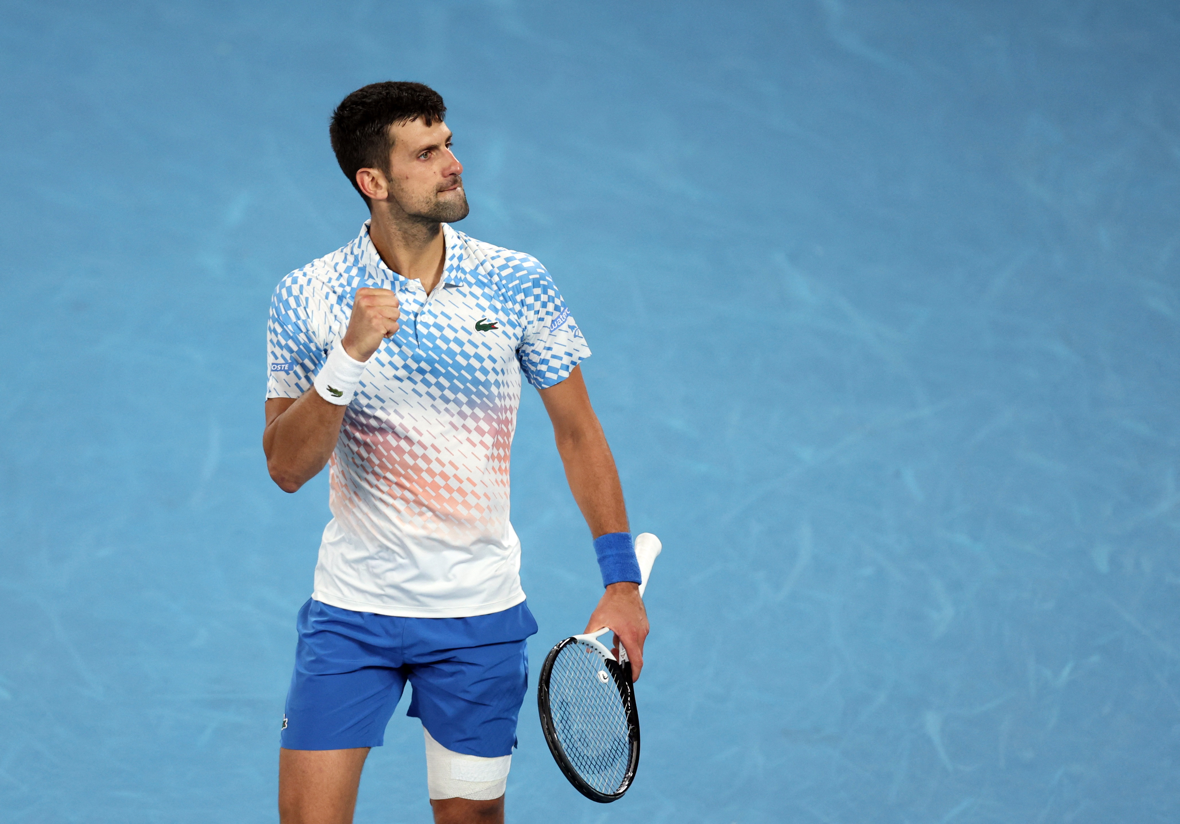 Tennis - Australian Open - Melbourne Park, Melbourne, Australia - January 25, 2023 Serbia’s Novak Djokovic reacts during his quarter final match against Russia’s Andrey Rublev REUTERS/Loren Elliott