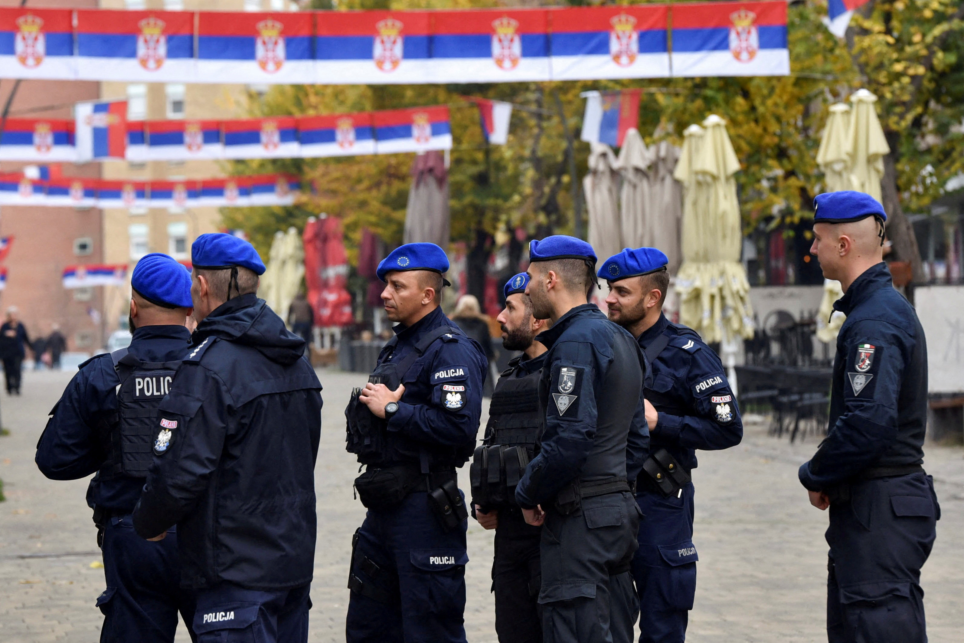 EULEX police officers patrol on foot in the north of Mitrovica