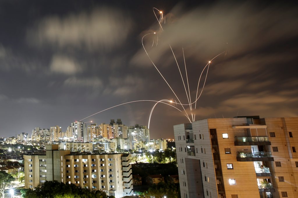 Streaks of light are seen as Israel's Iron Dome anti-missile system intercepts rockets launched from the Gaza Strip towards Israel, as seen from Ashkelon, Israel May 12, 2021. REUTERS/Amir Cohen