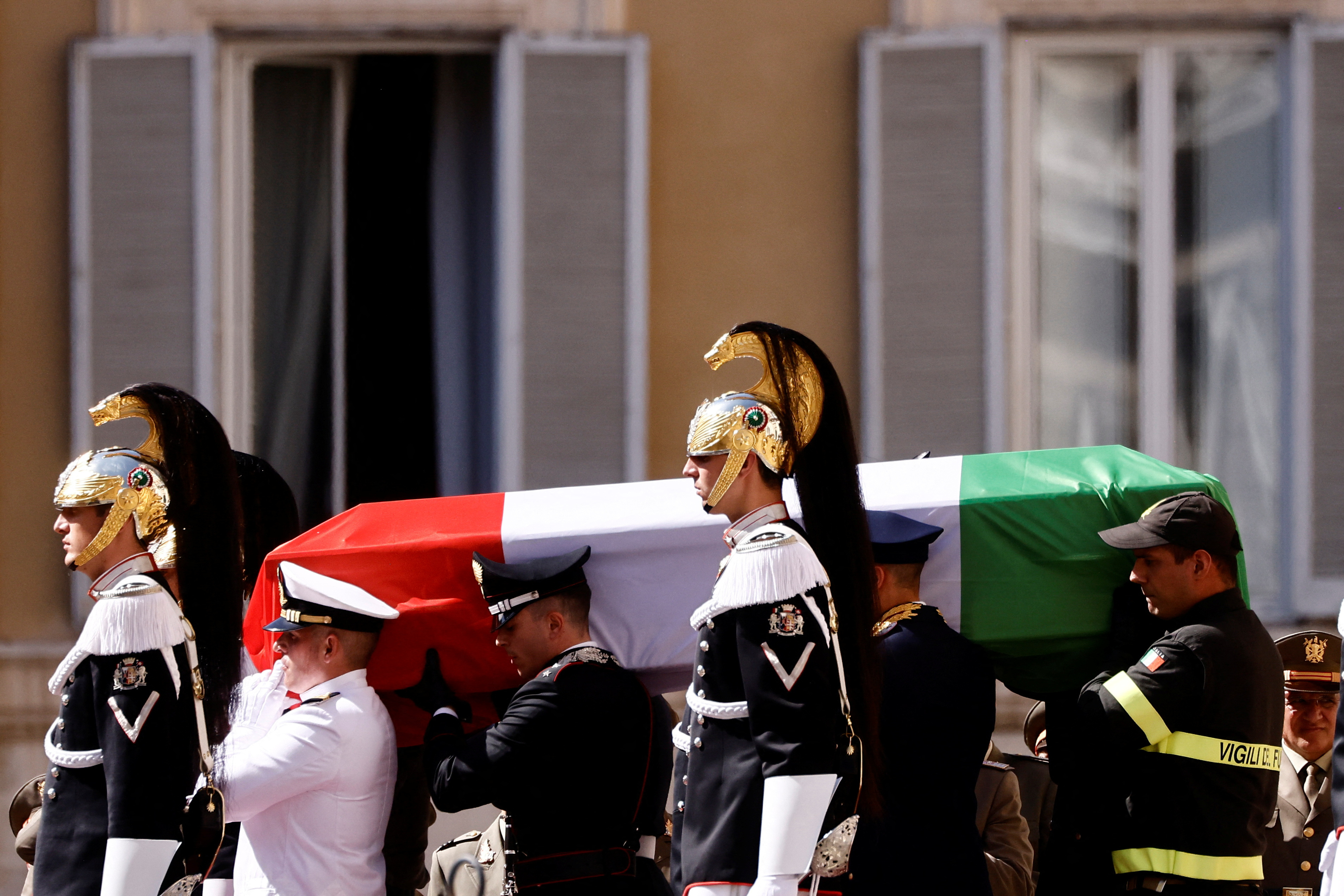 The coffin of former Italian President and senator, Giorgio Napolitano is carried during his state funeral in Rome, Italy, September 26, 2023. REUTERS/Yara Nardi
