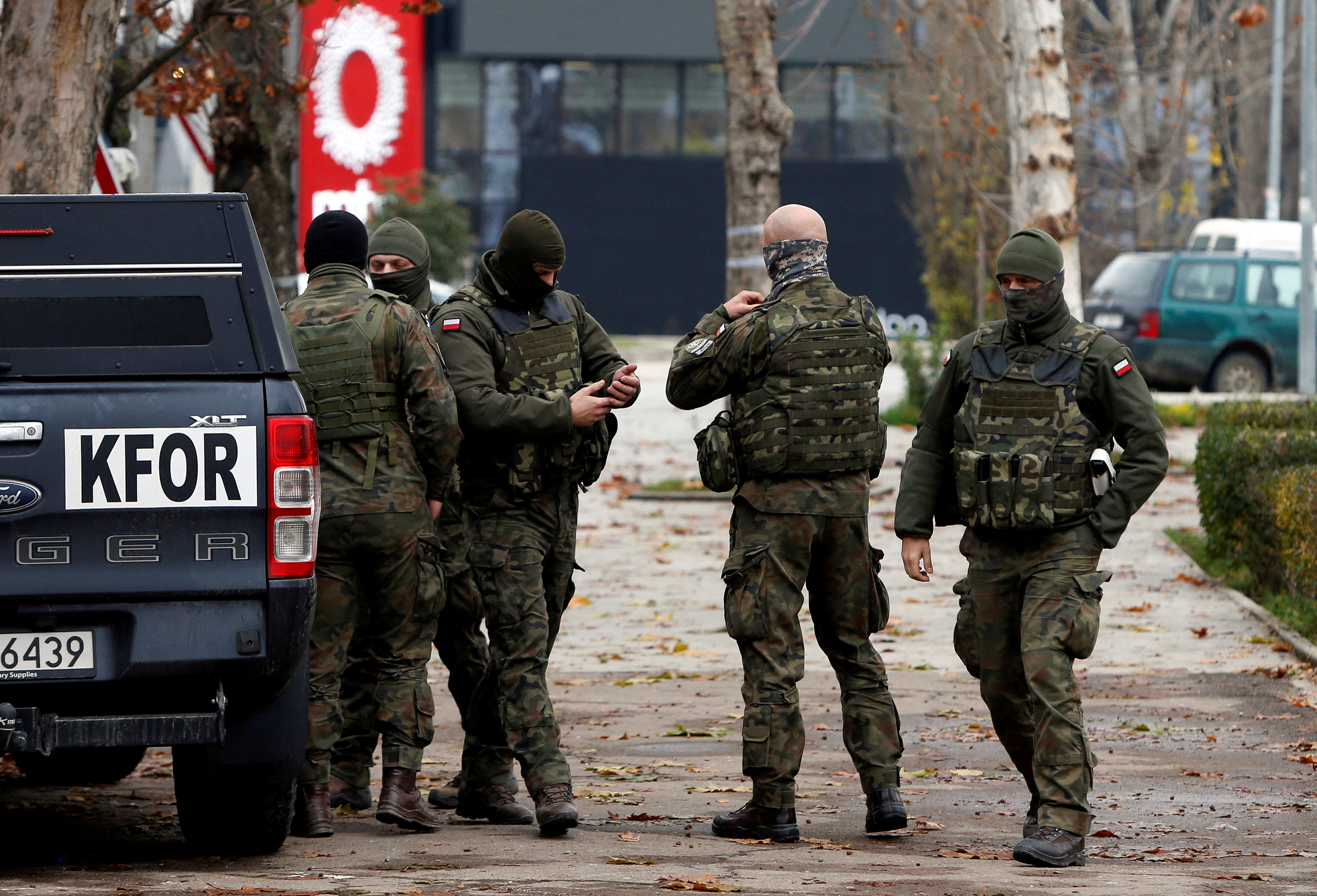 Polish KFOR soldiers patrol in North Mitrovica, Kosovo December 13, 2022. REUTERS/Ognen Teofilovski