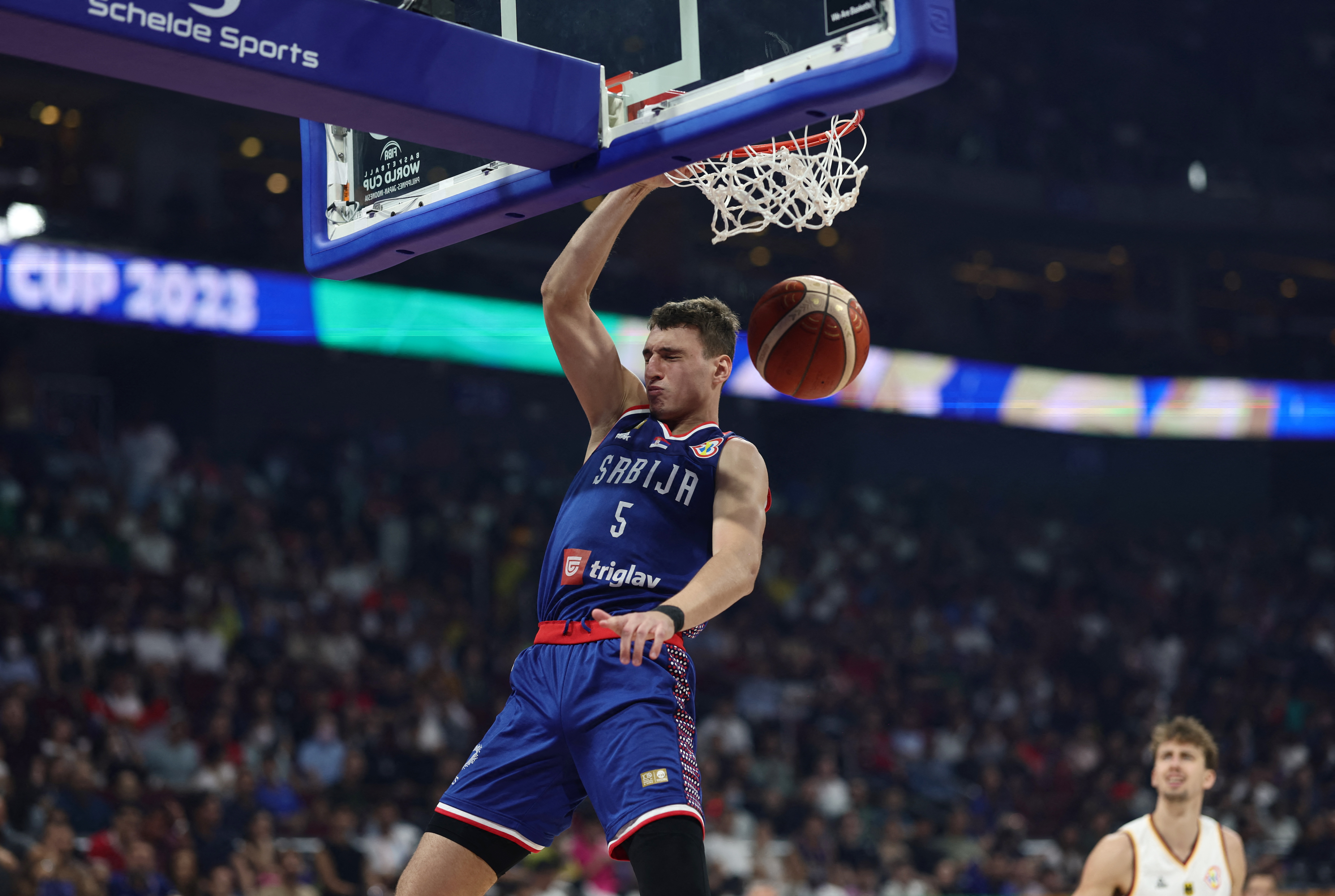 Basketball - FIBA World Cup 2023 - Final - Germany v Serbia - Mall of Asia Arena, Manila, Philippines - September 10, 2023 Serbia's Nikola Jovic scores a basket REUTERS/Eloisa Lopez