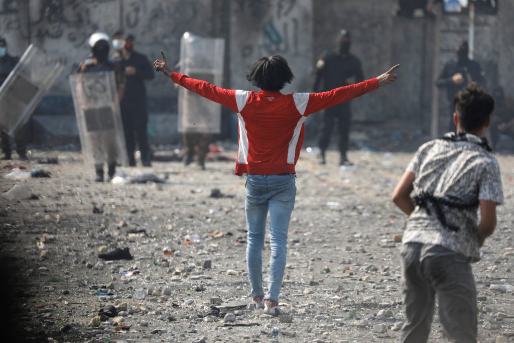 An Iraqi demonstrator reacts during anti-government protests in Baghdad, Iraq October 26, 2020. REUTERS/Khalid al-Mousily