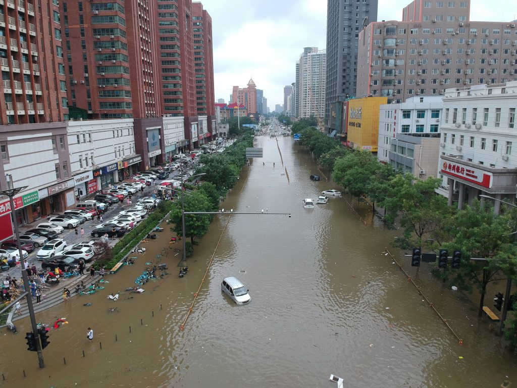 An aerial view shows a flooded road section following heavy rainfall in Zhengzhou, Henan province, China July 21, 2021. Picture taken with a drone. China Daily via REUTERS  ATTENTION EDITORS - THIS IMAGE WAS PROVIDED BY A THIRD PARTY. CHINA OUT.