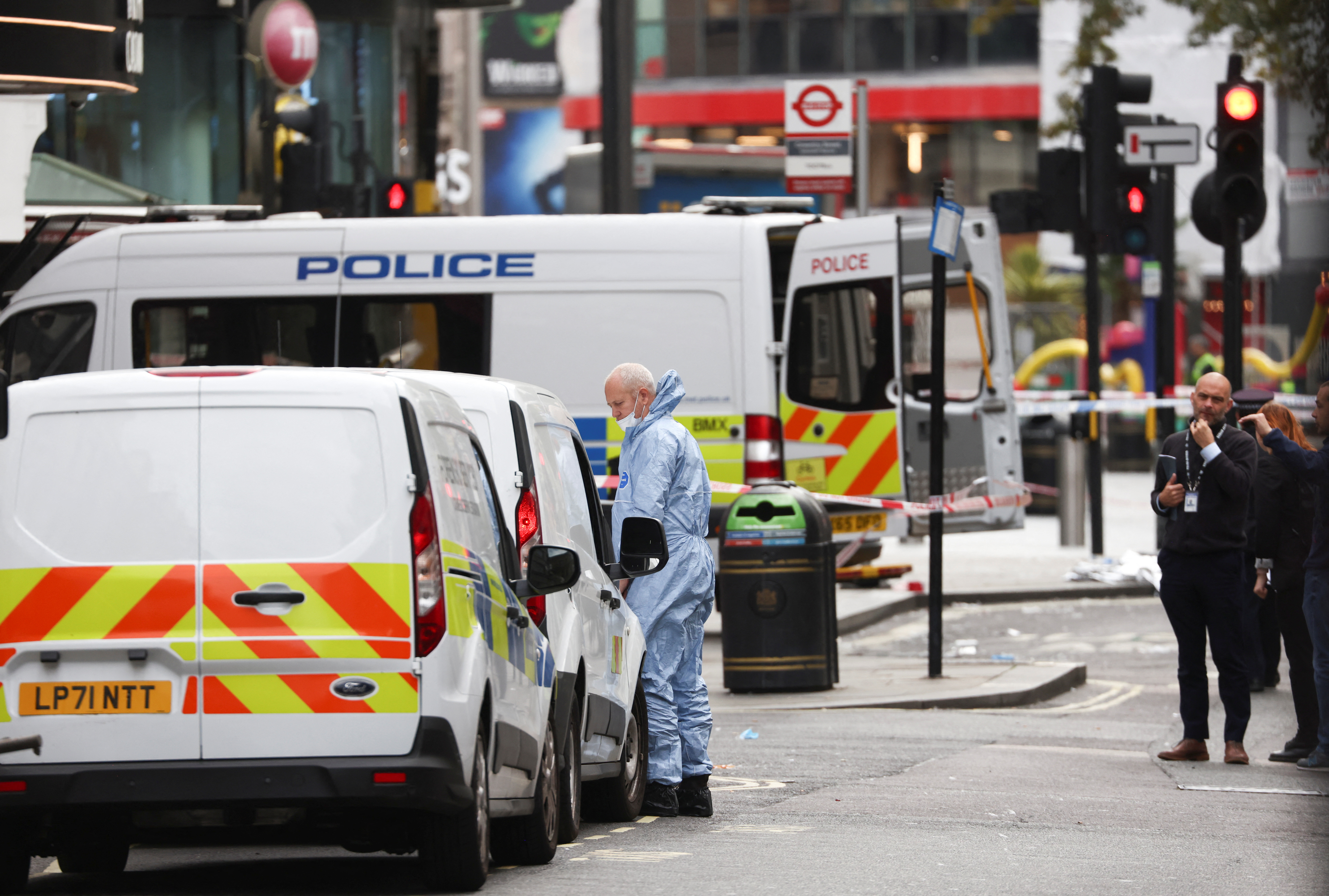 Forensic officer works at the scene where two policemen were stabbed, near Leicester Square, in London, Britain September 16, 2022. REUTERS/Tom Nicholson