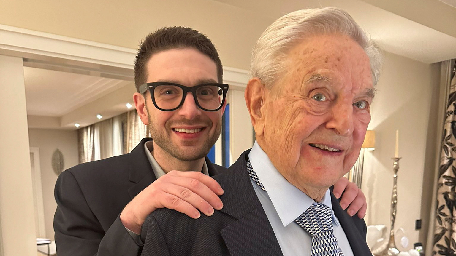 George Soros is seen with his son Alexander, in Munich