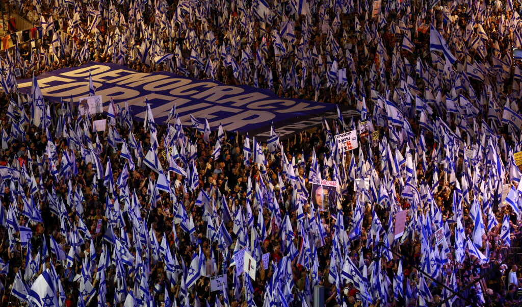 People take part in a demonstration against Israeli Prime Minister Benjamin Netanyahu and his nationalist coalition government's judicial overhaul, in Tel Aviv, Israel May 27, 2023. REUTERS/Ronen Zvulun