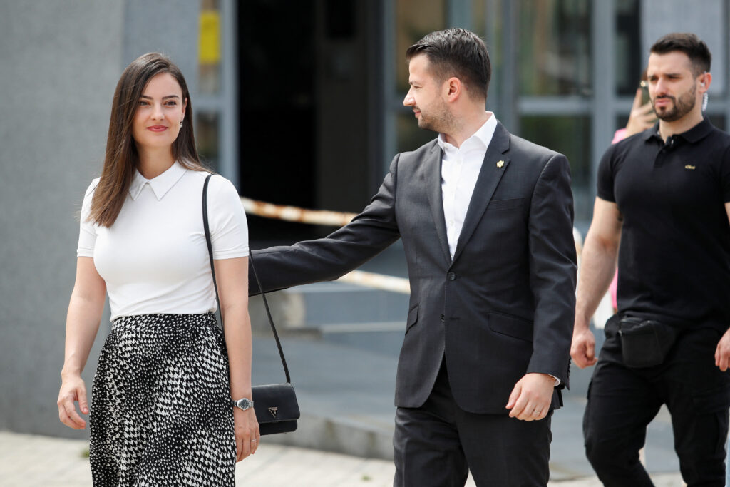 Montenegro's President Jakov Milatovic and his wife Milena walk outside a polling station during snap parliamentary elections in Podgorica, Montenegro, June 11, 2023. REUTERS/Stevo Vasiljevic