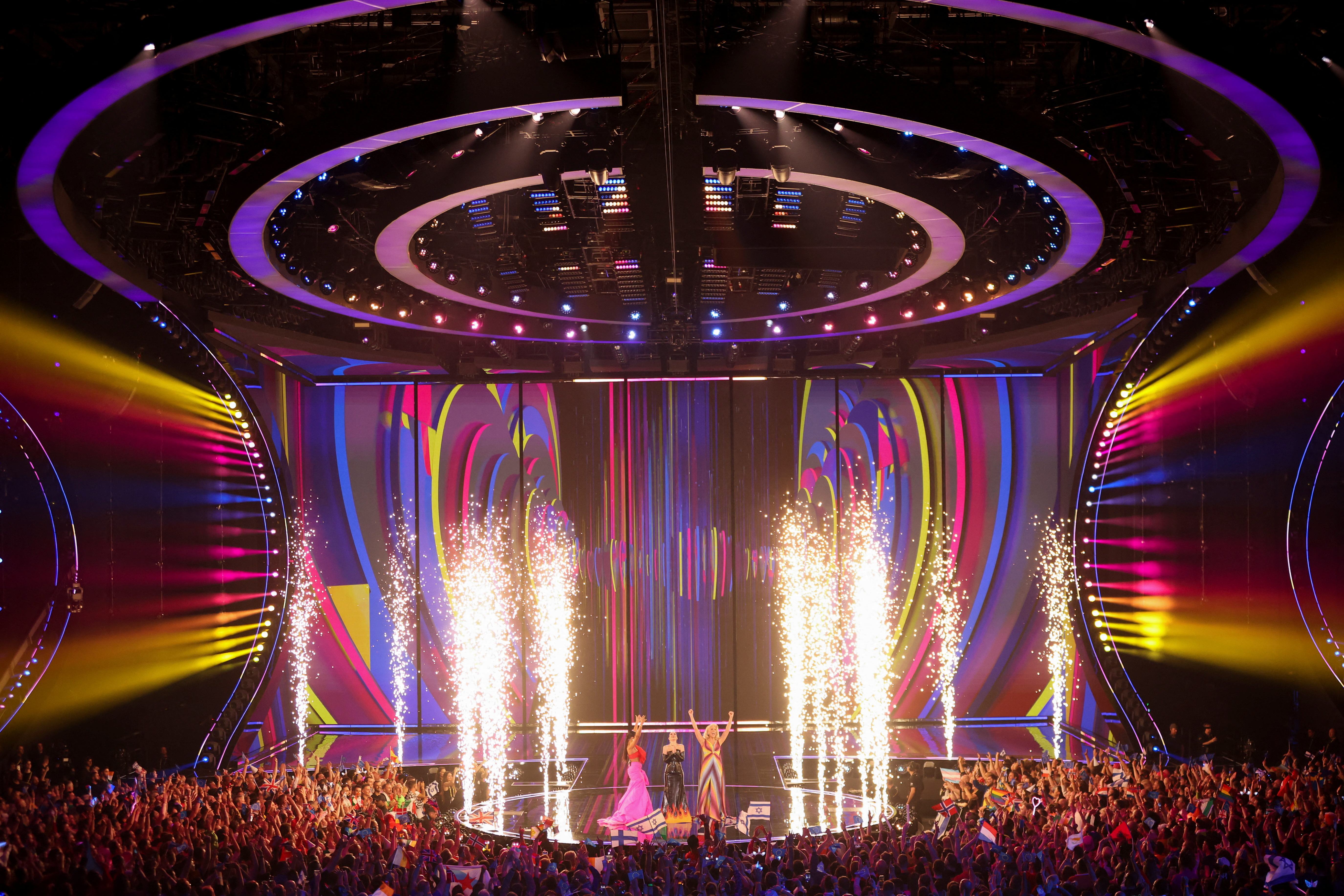 Hosts Julia Sanina, Hannah Waddingham and Alesha Dixon gesture on stage during the first semi-final of the 2023 Eurovision Song Contest in Liverpool, Britain, May 9, 2023. REUTERS/Phil Noble