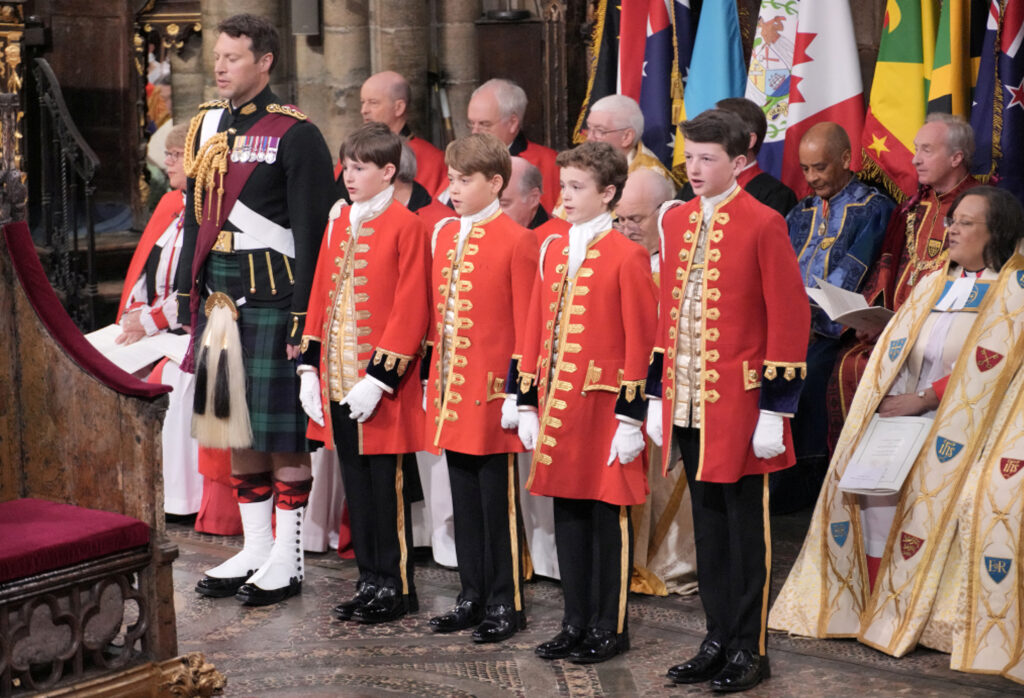 Pages Prince George, Lord Oliver Cholmondley, Nicholas Barclay, Ralph Tollemache at the coronation ceremony of King Charles III and Queen Camilla in Westminster Abbey, London. Picture date: Saturday May 6, 2023.  Jonathan Brady/Pool via REUTERS