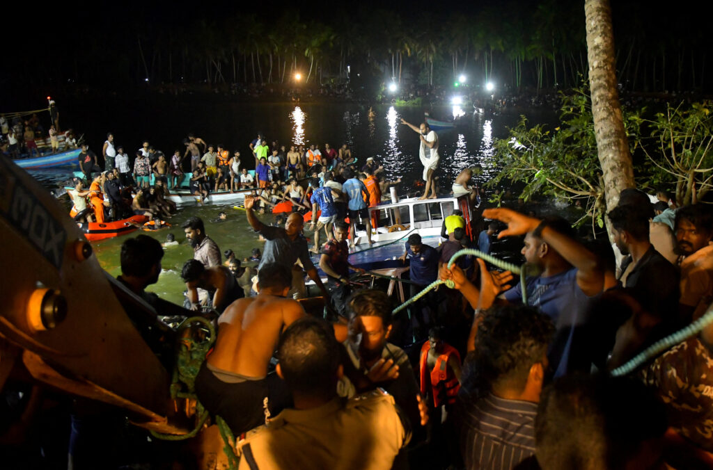 Rescue team members search for survivors after a boat capsized off the coastal town of Tanur in the Malappuram district of the southern state of Kerala, India, May 7, 2023. REUTERS/Stringer NO RESALES. NO ARCHIVES
