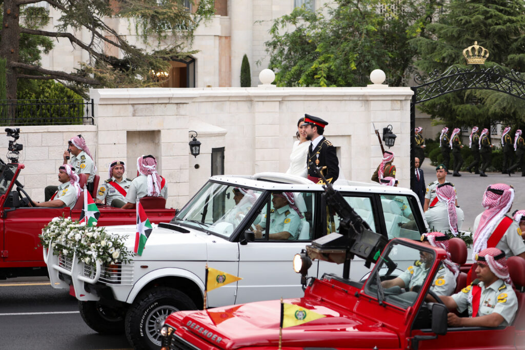 Jordan's Crown Prince Hussein and Rajwa Al Saif leave the Zahran Palace, on the day of their royal wedding in Amman, Jordan, June 1, 2023. REUTERS/Alaa Al Sukhni