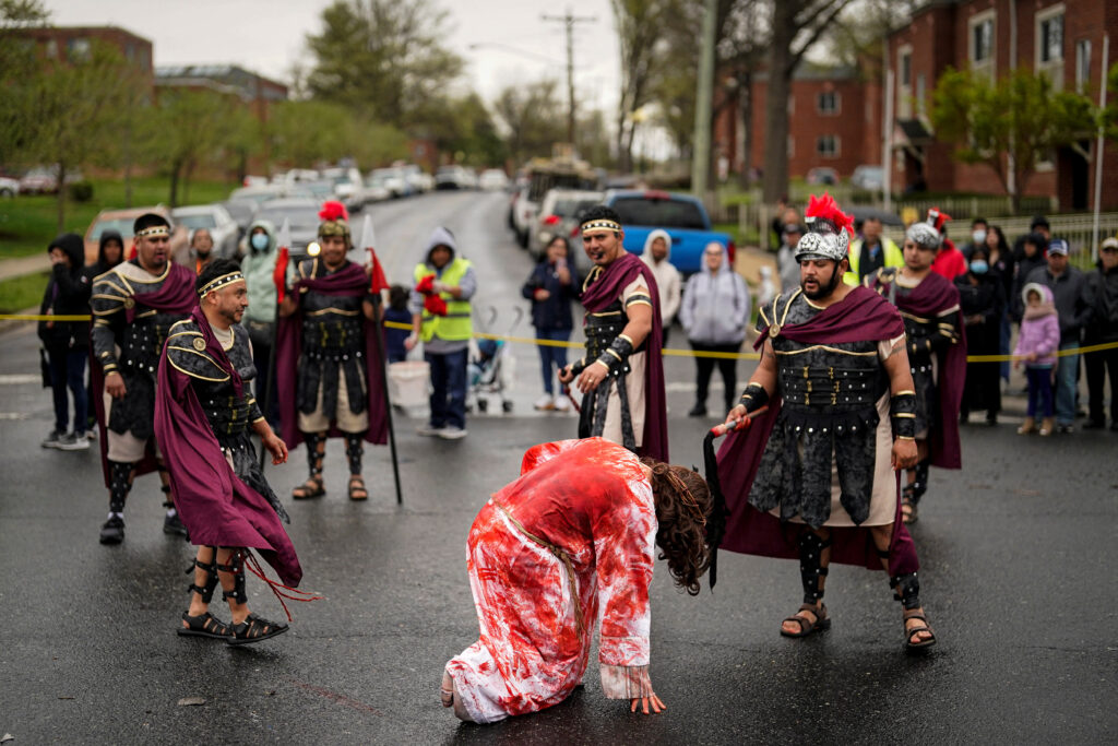 Giovanni Garcia, from Upper Marlboro, portrays the role of Jesus Christ during the reenactment of the Via Crucis, also known as the Way of the Cross, as part of Good Friday celebrations, in Adelphi, Maryland, U.S., April 7, 2023. REUTERS/Al Drago