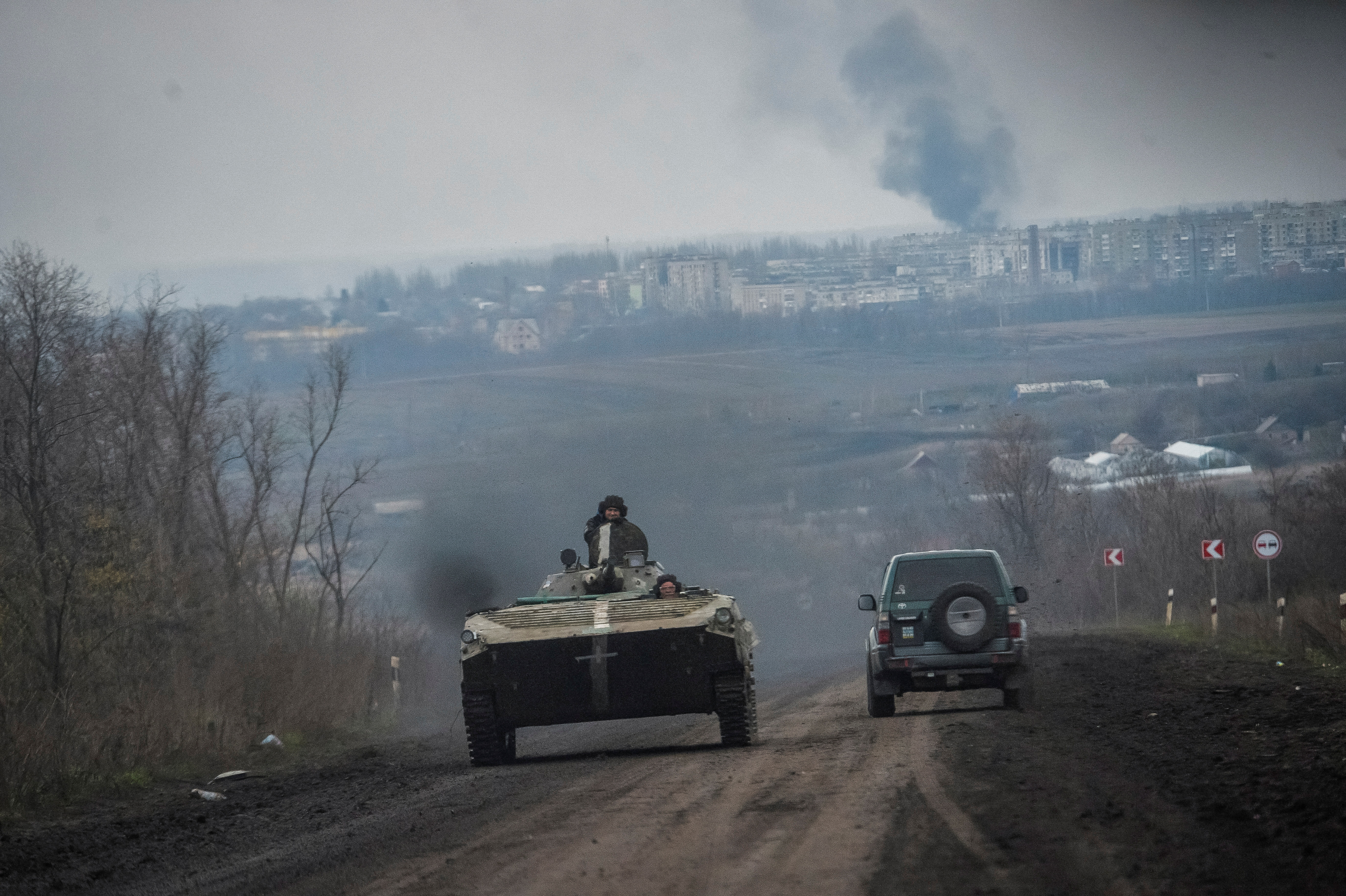 Ukrainian service members ride a BMP-1 infantry fighting vehicle, as Russia's attack on Ukraine continues, near the front line city of Bakhmut, Ukraine April 6, 2023. REUTERS/Oleksandr Klymenko