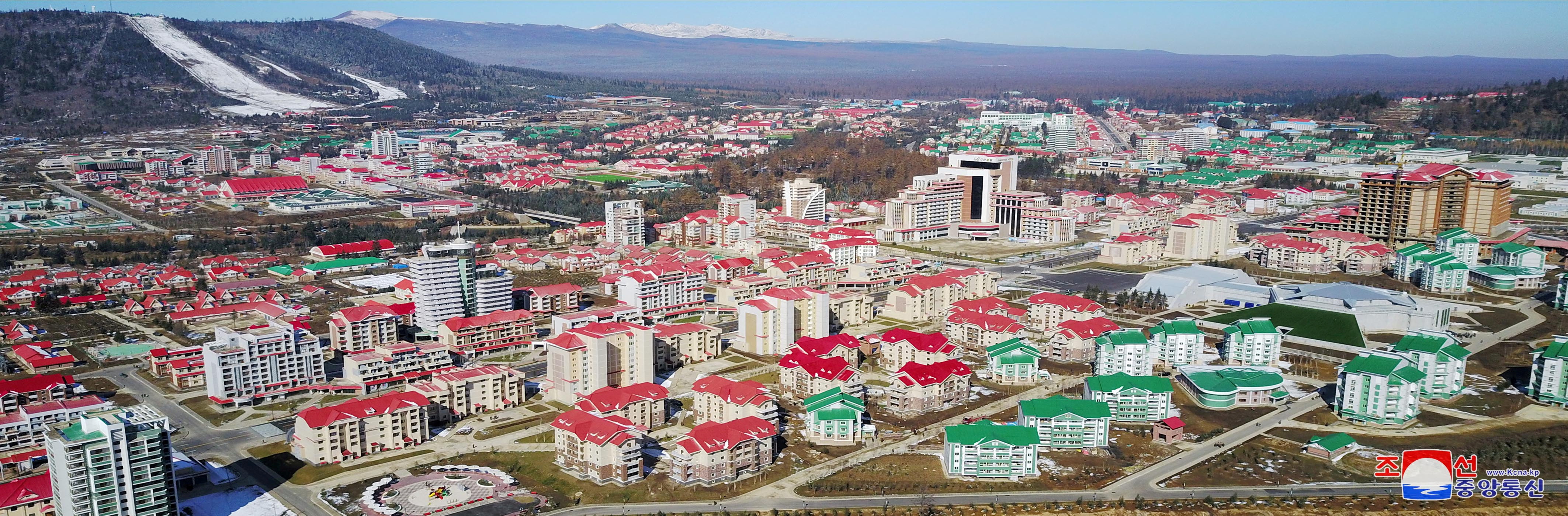 FILE PHOTO: Buildings and construction sites are seen in Samjiyon County