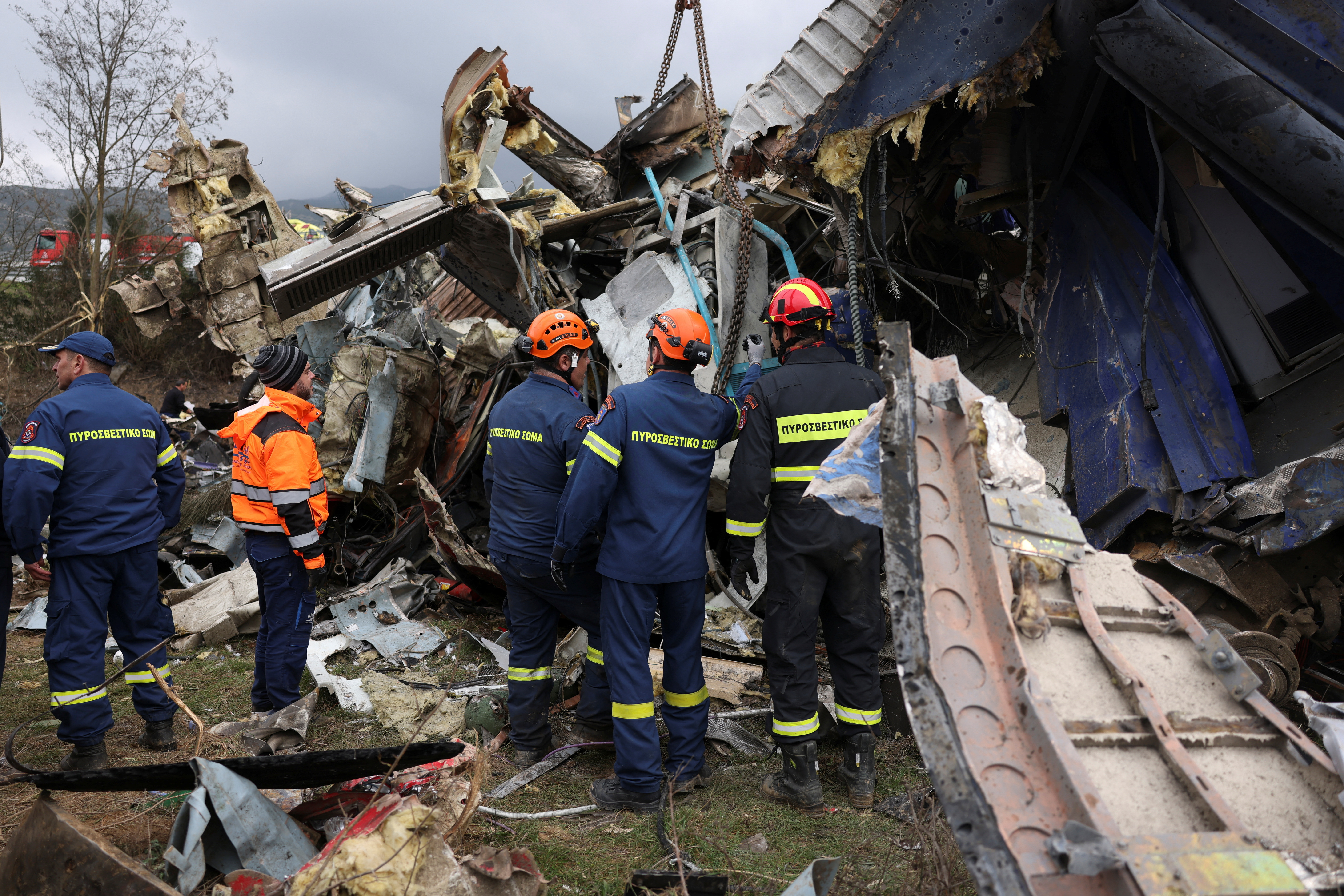 Rescuers operate at the site of a crash, where two trains collided, near the city of Larissa, Greece, March 1, 2023. REUTERS/Alexandros Avramidis