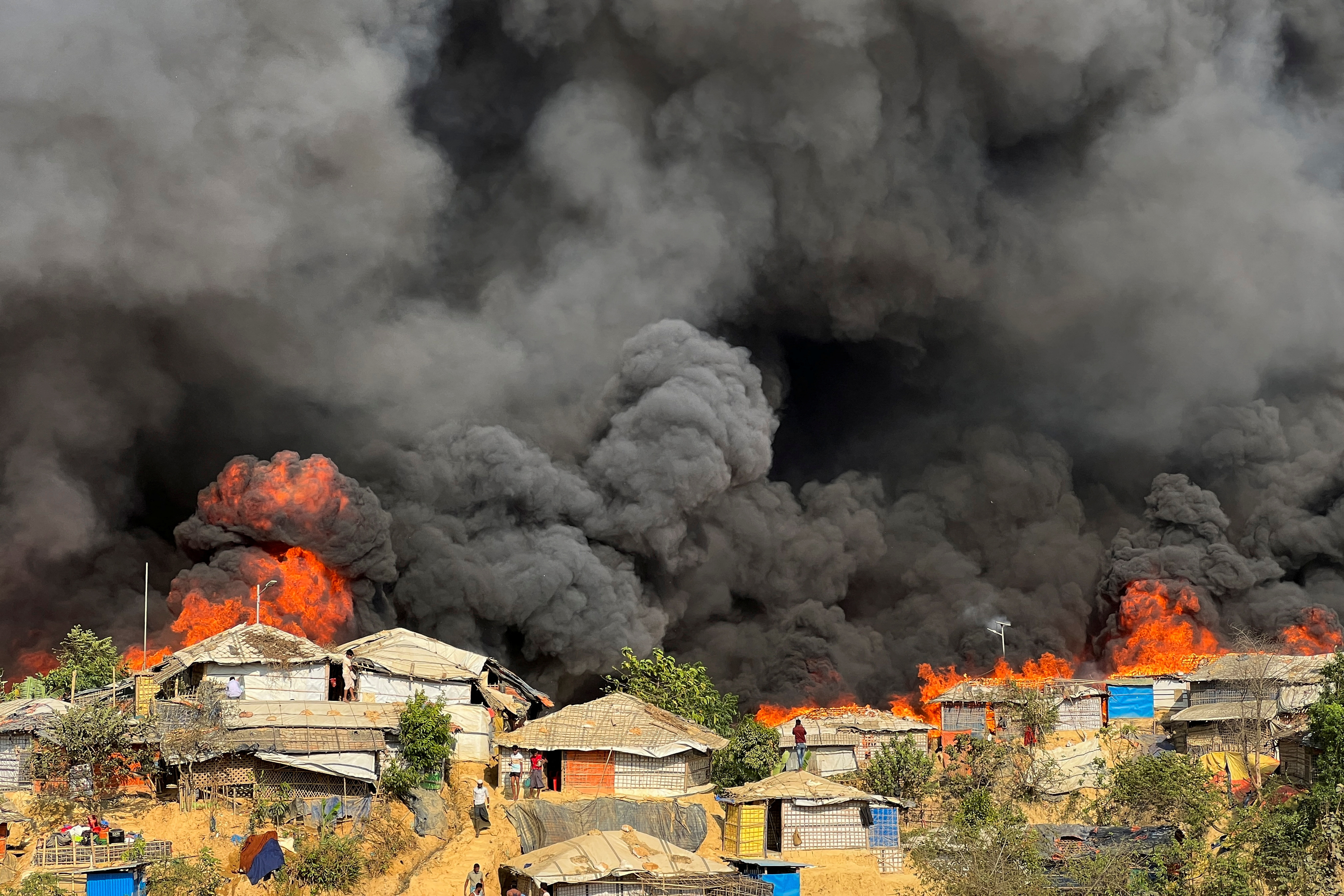 Fire burns in the Rohingya refugee camp in Balukhali in Cox's Bazar, Bangladesh, March 5, 2023. REUTERS/Ro Yassin Abdumonab       NO RESALES. NO ARCHIVES.
