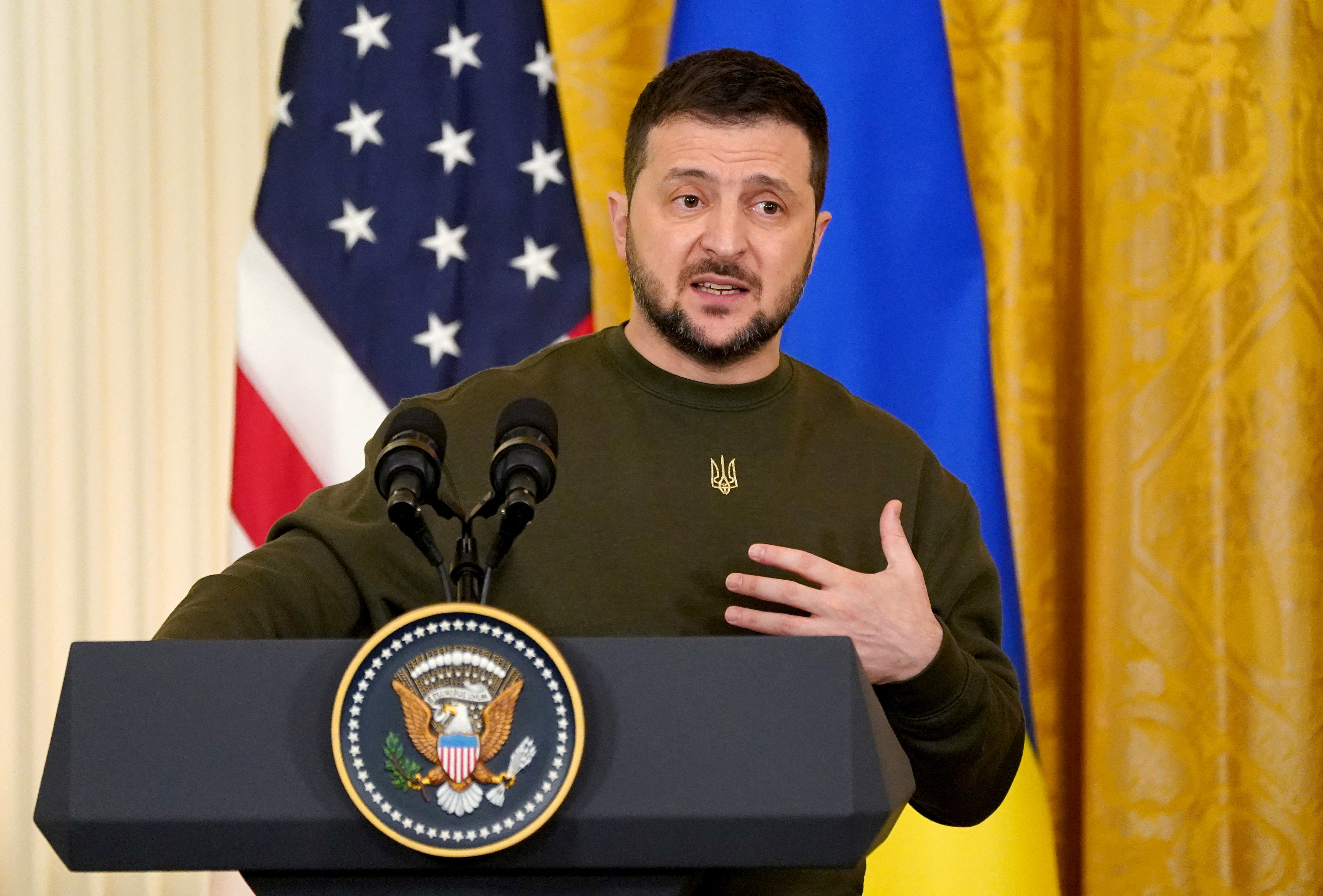 Ukraine's President Volodymyr Zelenskiy speaks during a joint news conference with U.S. President Joe Biden (not pictured) in the East Room of the White House in Washington, U.S., December 21, 2022. REUTERS/Kevin Lamarque