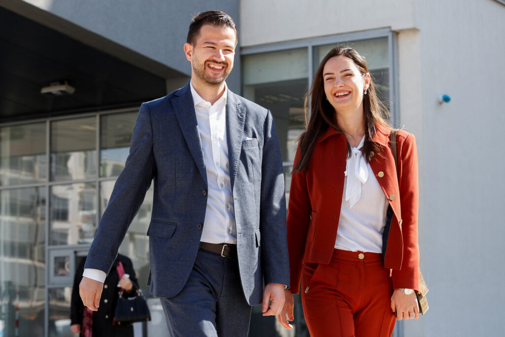 Jakov Milatovic, a presidential candidate from the Europe Now Movement, walks with his wife Milena after casting their vote at a polling station during the presidential elections in Podgorica, Montenegro, March 19, 2023. REUTERS/Stevo Vasiljevic