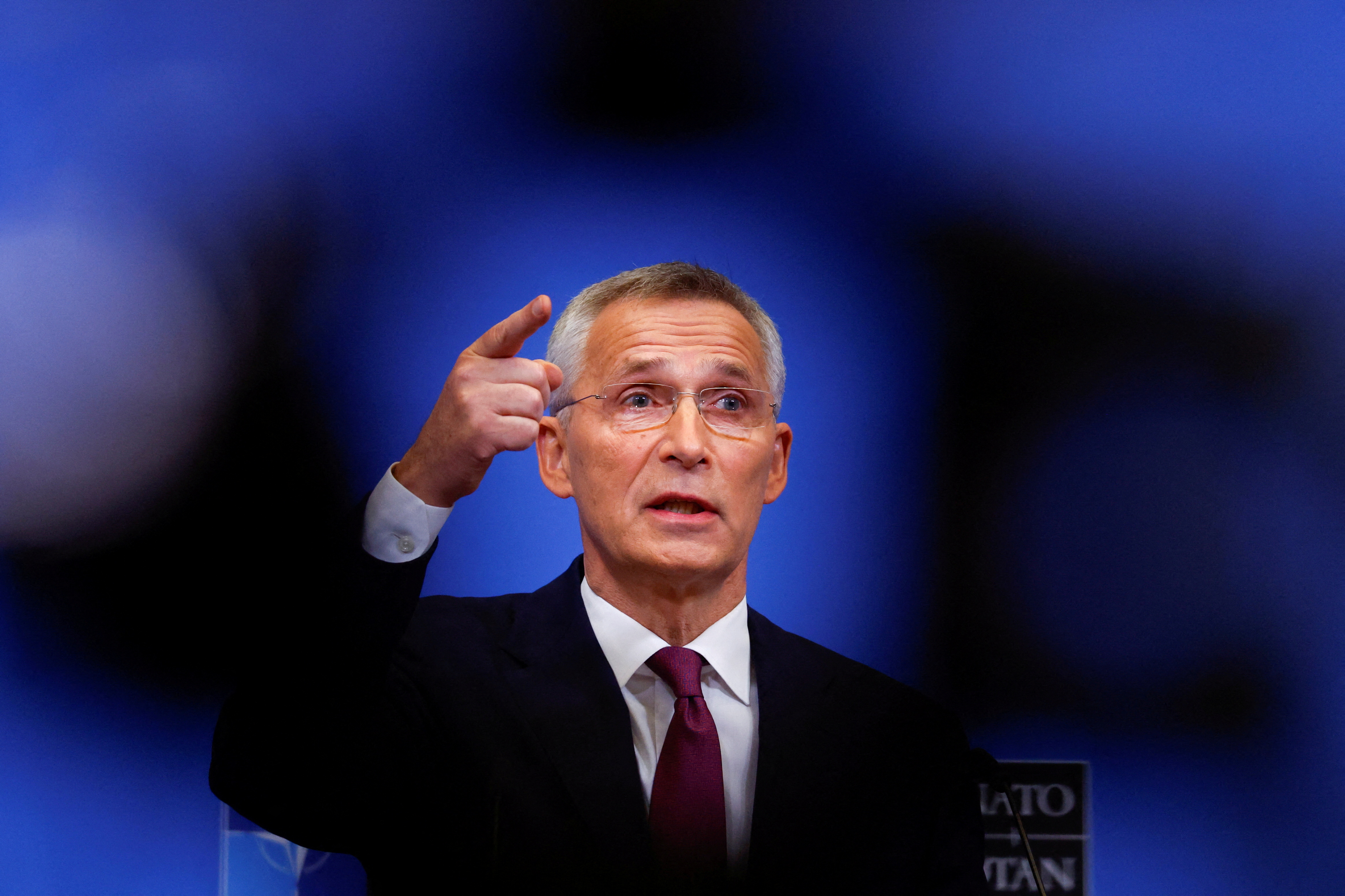 NATO Secretary General Jens Stoltenberg speaks during a news conference on the eve of a NATO summit, amid Russia's invasion of Ukraine, in Brussels, Belgium March 23, 2022. REUTERS/Gonzalo Fuentes