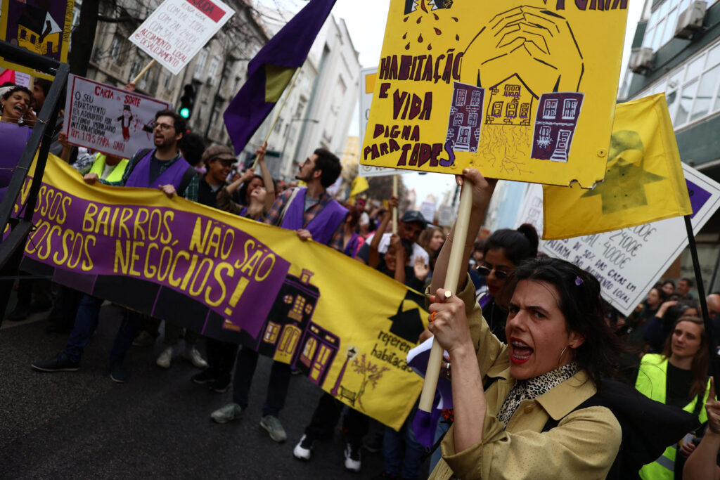 People shout slogans during a demonstration for the right to affordable housing in Lisbon, Portugal, April 1, 2023. REUTERS/Pedro Nunes