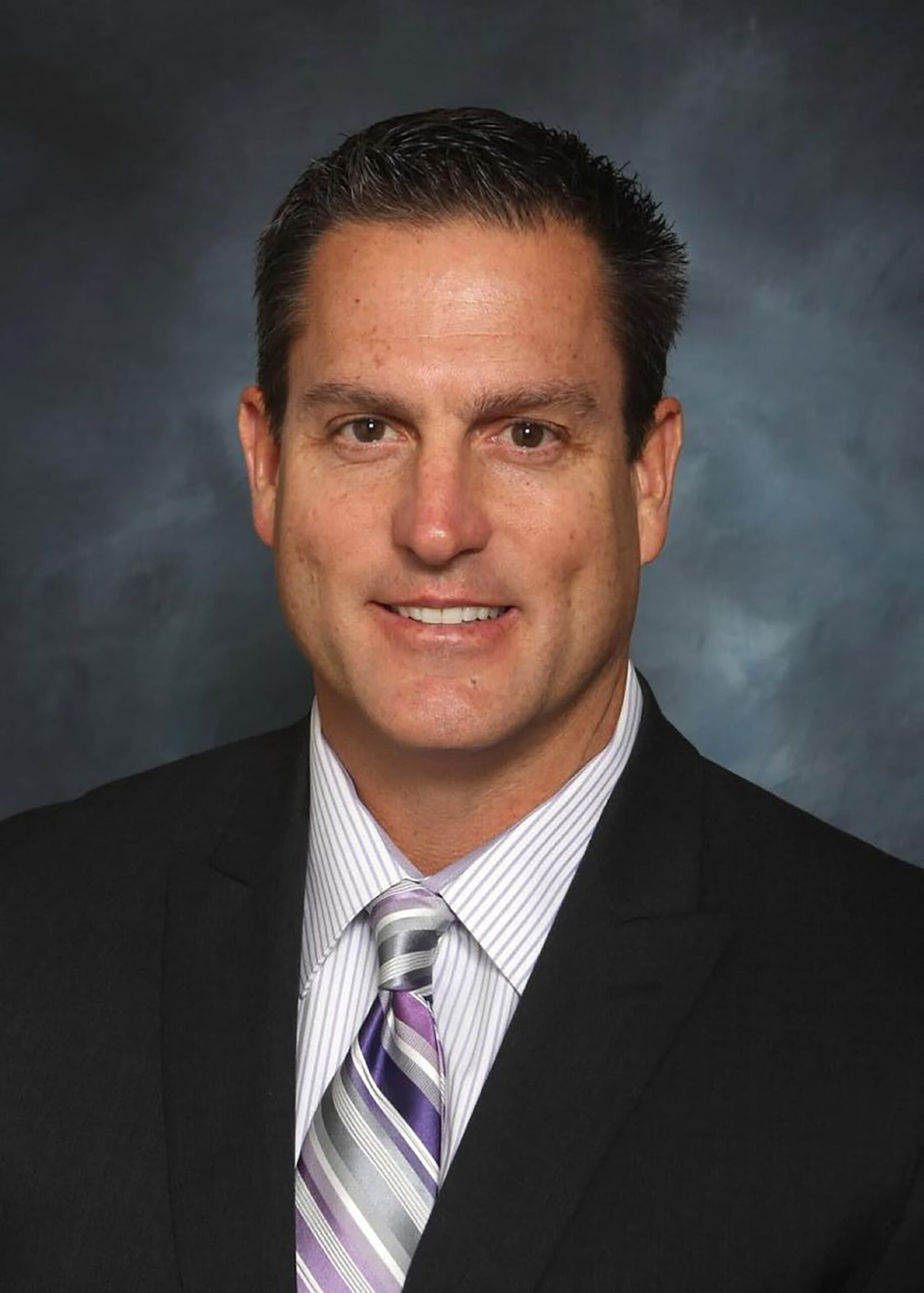 Dr. Michael Mammone, 58, was killed Wednesday by a motorist who struck his bicycle and then attacked him in Southern California, authorities said.
