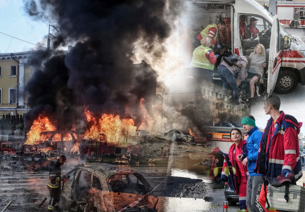Cars burn after Russian military strike, as Russia's invasion of Ukraine continues, in central Kyiv, Ukraine October 10, 2022.  REUTERS/Gleb Garanich