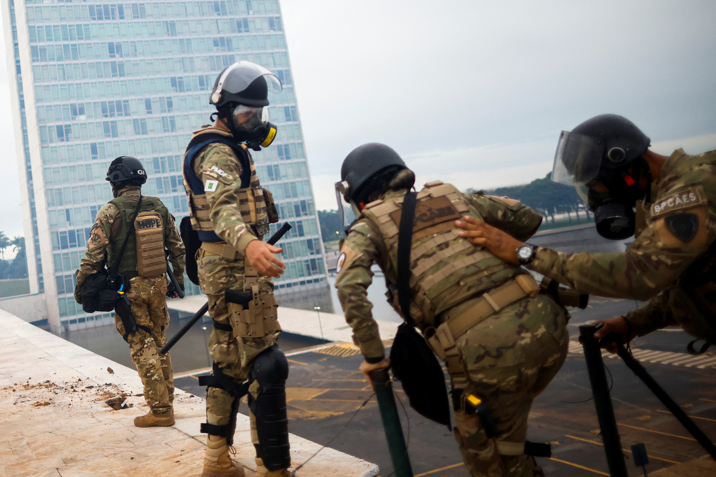 Security forces operate as supporters of Brazil's former President Jair Bolsonaro demonstrate against President Luiz Inacio Lula da Silva, outside Brazil’s National Congress in Brasilia, Brazil, January 8, 2023. REUTERS/Adriano Machado