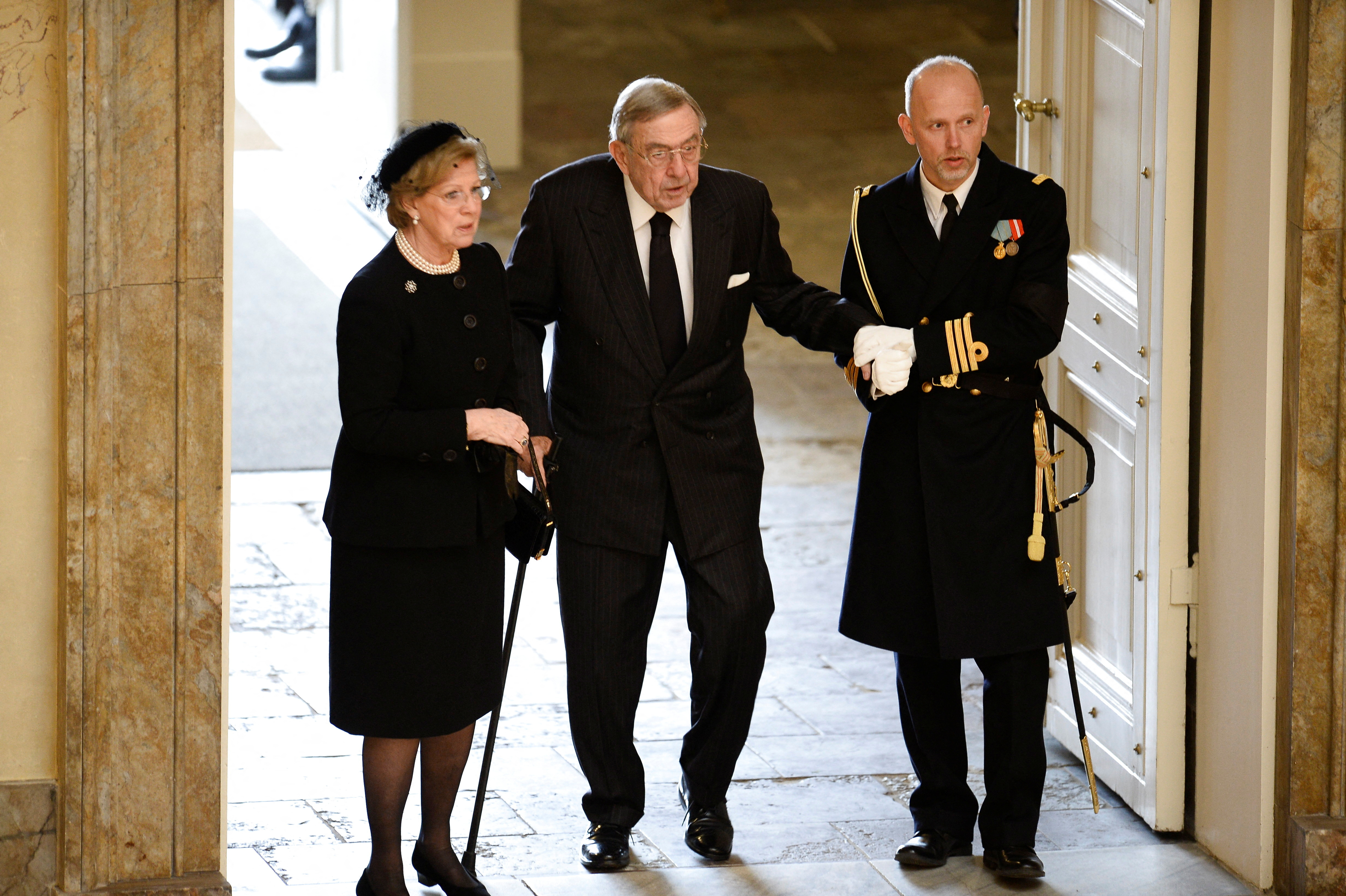 Queen Anne-Marie and King Constantin II of Greece arrive at the funeral of Prince Henrik of Denmark