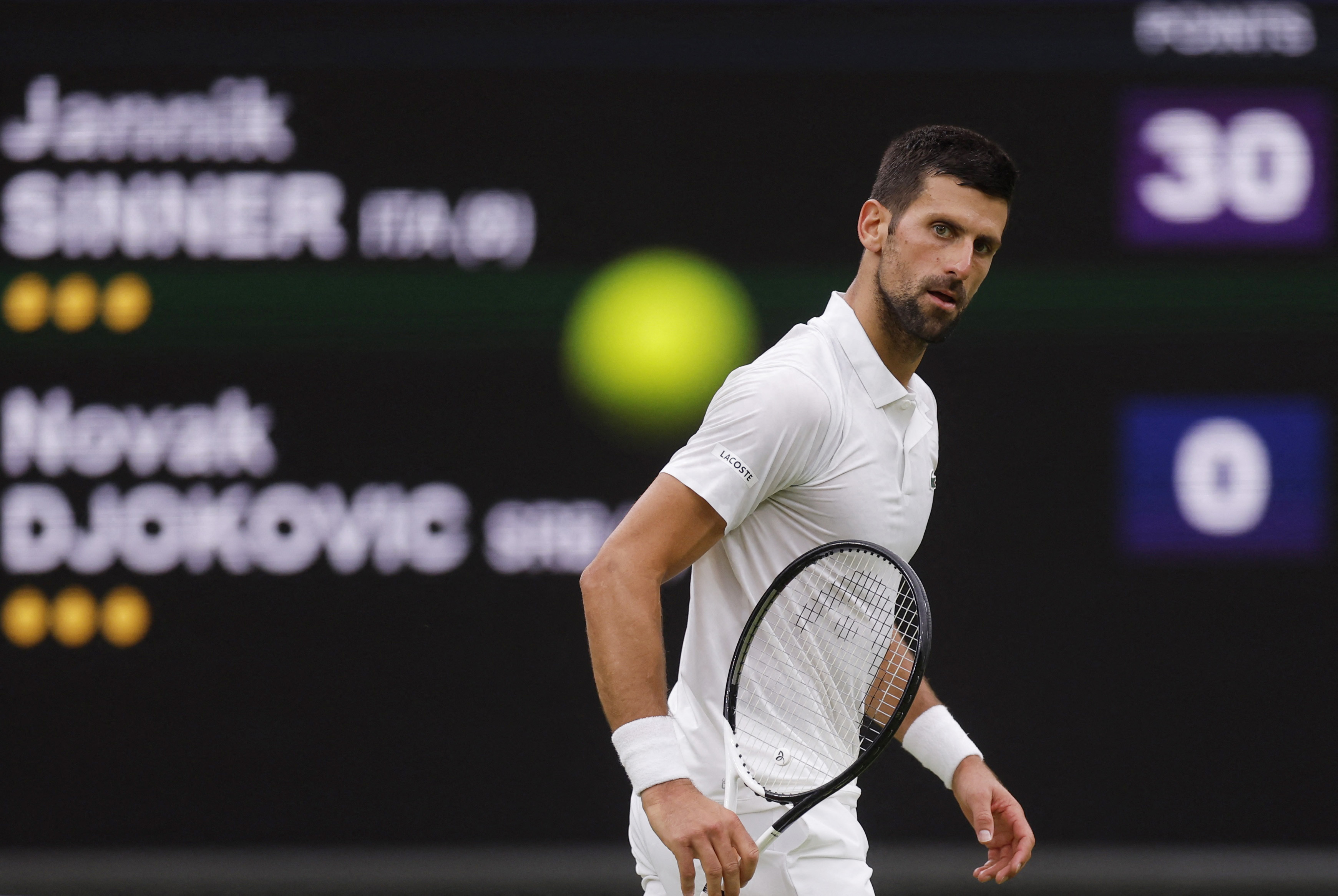 Tennis - Wimbledon - All England Lawn Tennis and Croquet Club, London, Britain - July 14, 2023 Serbia's Novak Djokovic reacts during his semi final match against Italy's Jannik Sinner REUTERS/Andrew Couldridge