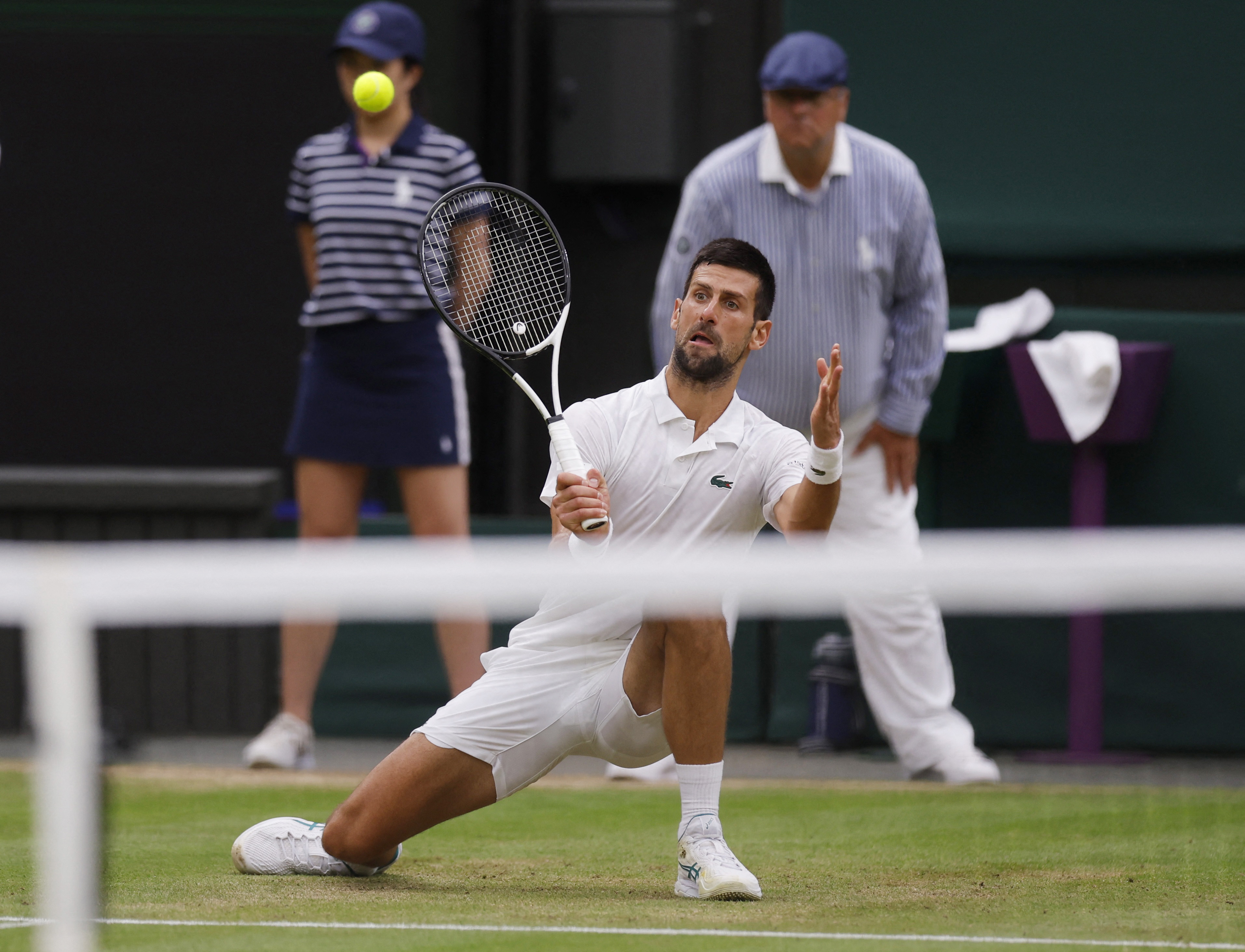 Tennis - Wimbledon - All England Lawn Tennis and Croquet Club, London, Britain - July 14, 2023 Serbia's Novak Djokovic in action during his semi final match against Italy's Jannik Sinner REUTERS/Andrew Couldridge